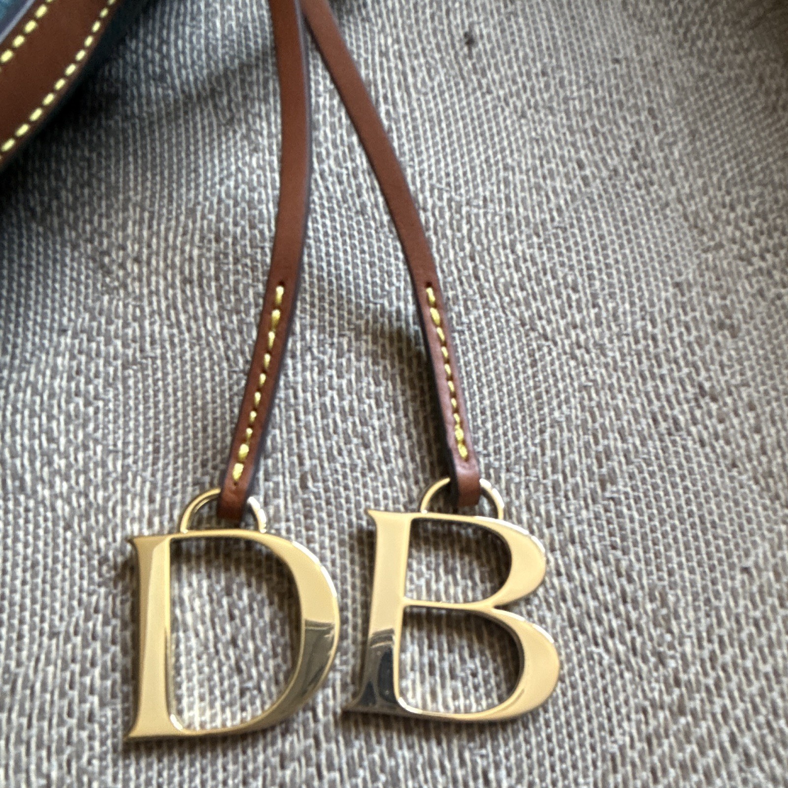 Dooney & Bourke Pebble Grain Blue/Brown Crossbody Zip, Adjustable Strap, Pockets