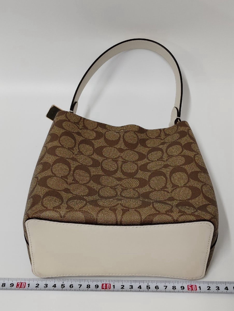 Coach Authentic Signature Small Town Bucket Bag Elevate your everyday style