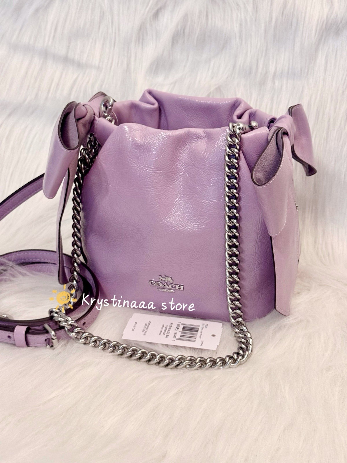 NWT Coach Faye Mini Drawstring Bag With Bows CEL03 in Light Amethyst Leather