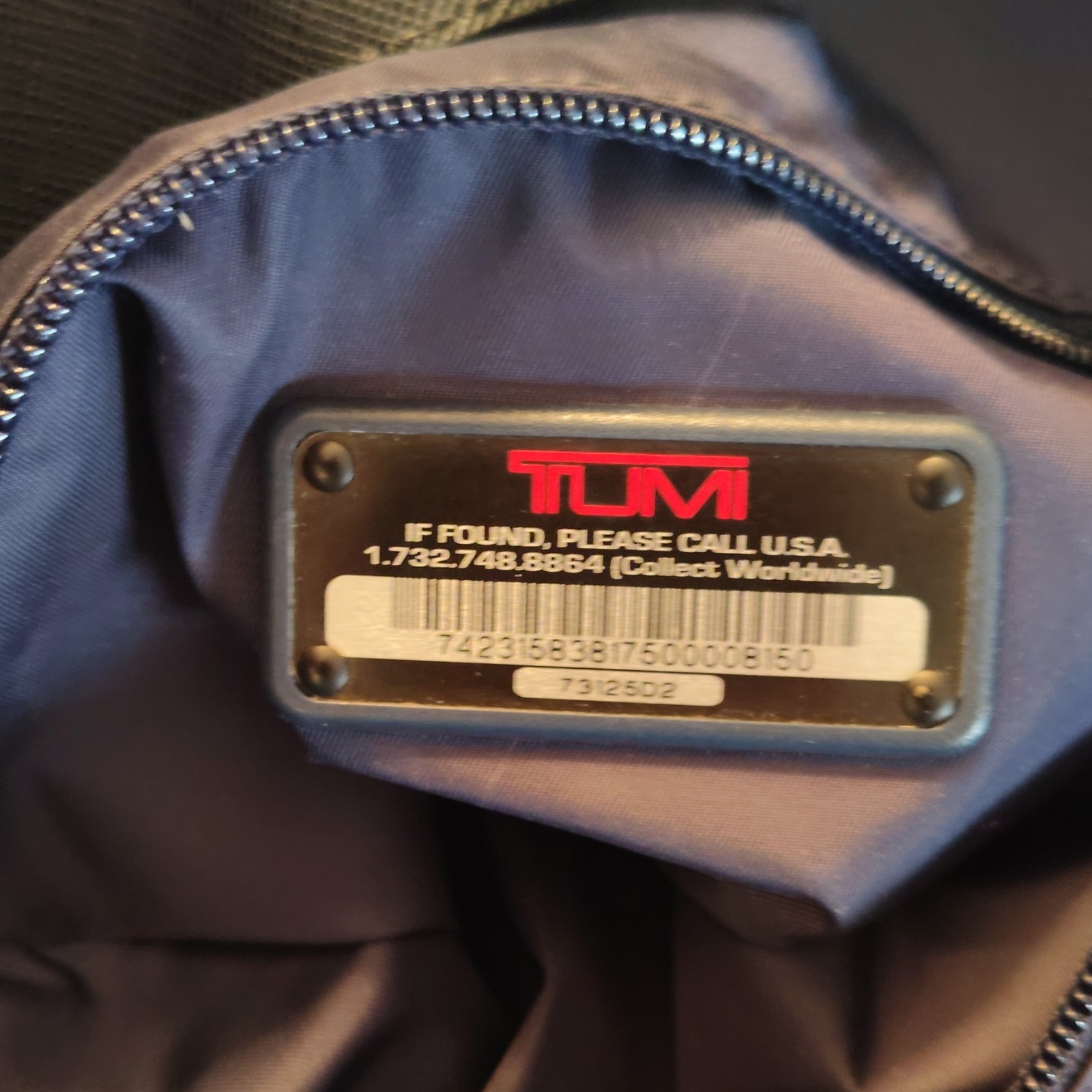 Tumi Black Buckle Accent Women’s Tote with Inner Pockets & Bottom Studs