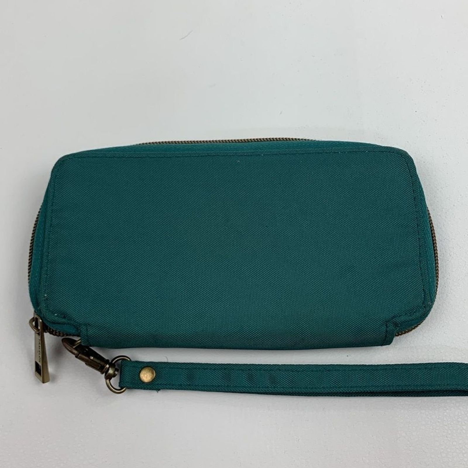 Travelon Dark Teal Green Clutch Wristlet wallet & brass Accents Zip around strap