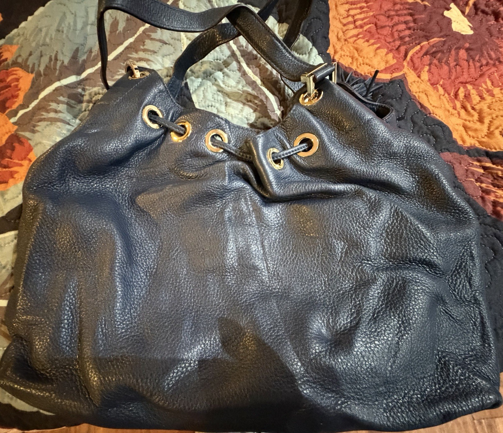 Michael Kors Black Pebbled Hobo Shoulder Bag Drawstring Tassel Logo Charm Gold