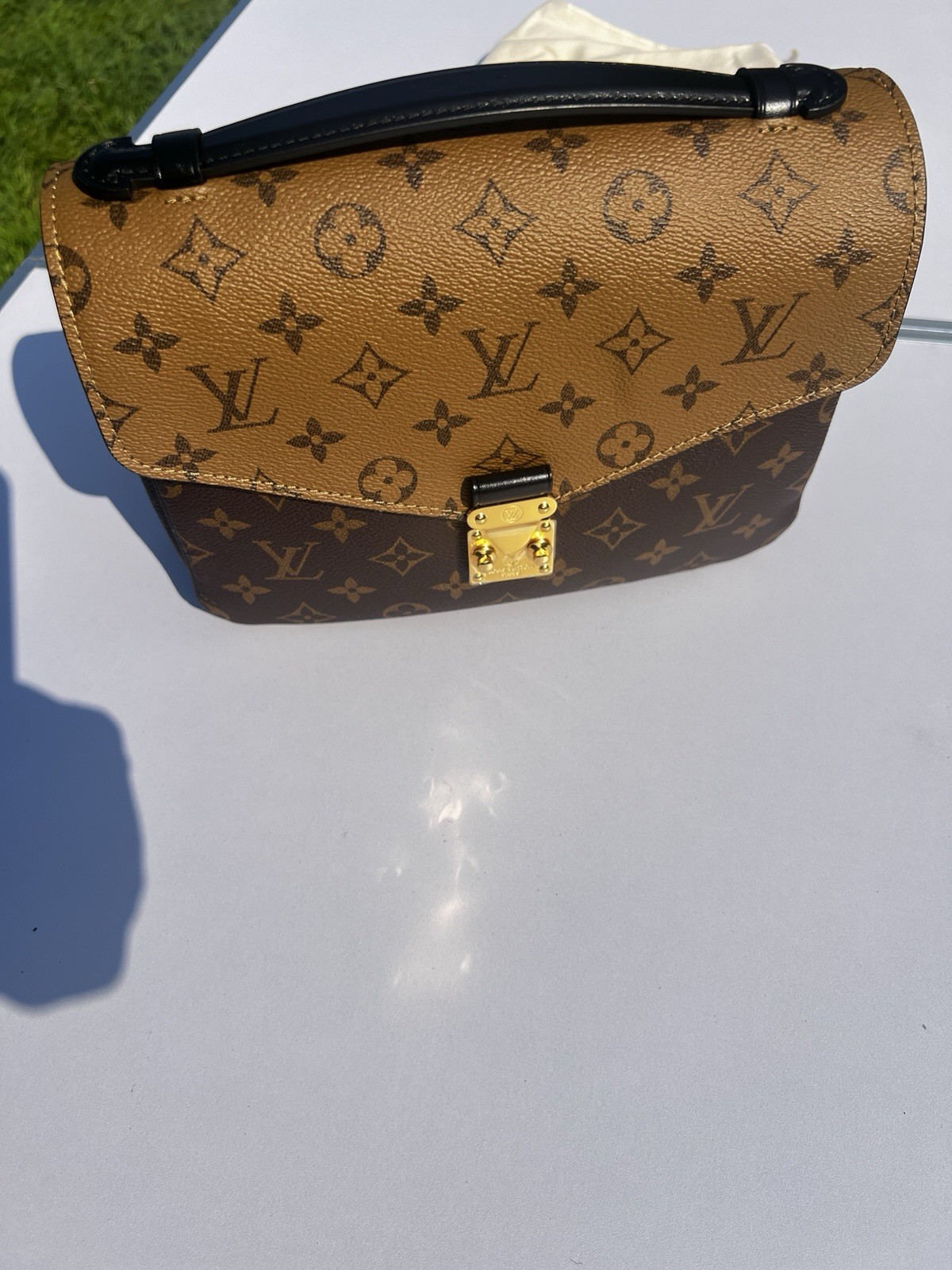 Louis Vuitton Pochette Métis Reverse Monogram Brown/Tan Satchel Push Lock
