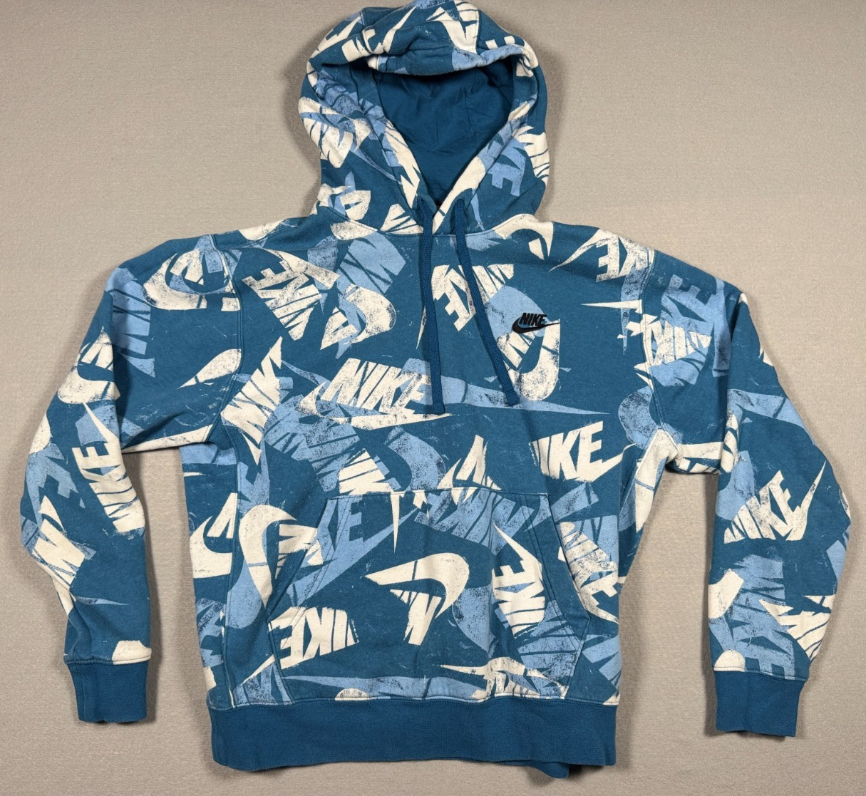 Nike Sportswear Essentials All Over White Nike Logo Print Hoodie – Blue – Size M
