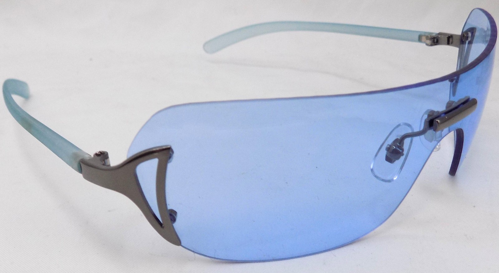 Ultra Stylish Rimless Blue Lens Sunglasses Silver Designer Look Lightweight