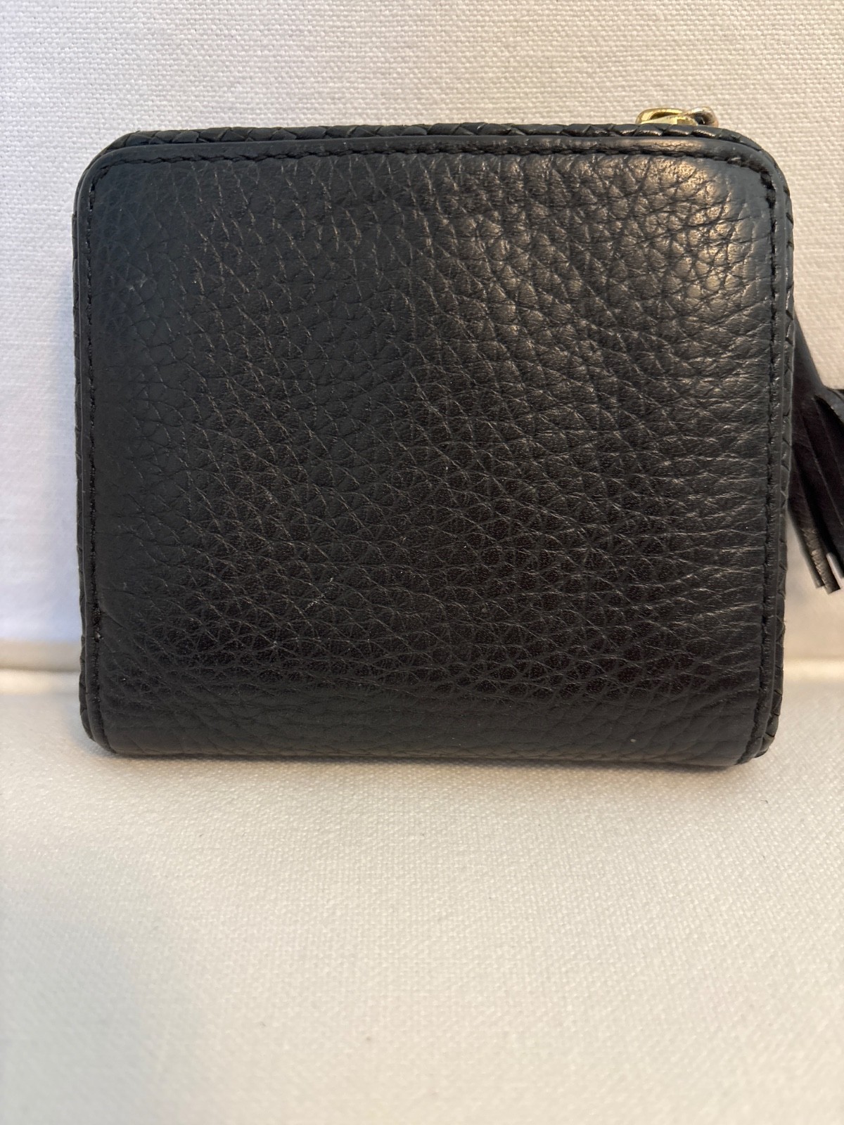 Tory Burch Thea Black Pebbled Leather Bifold Zip Wallet Tassel Gold Tone Logo