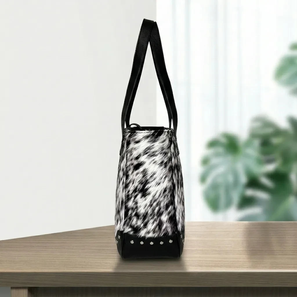 natural-black-and-white-speckled-hair-on-cowhide-leather-bag