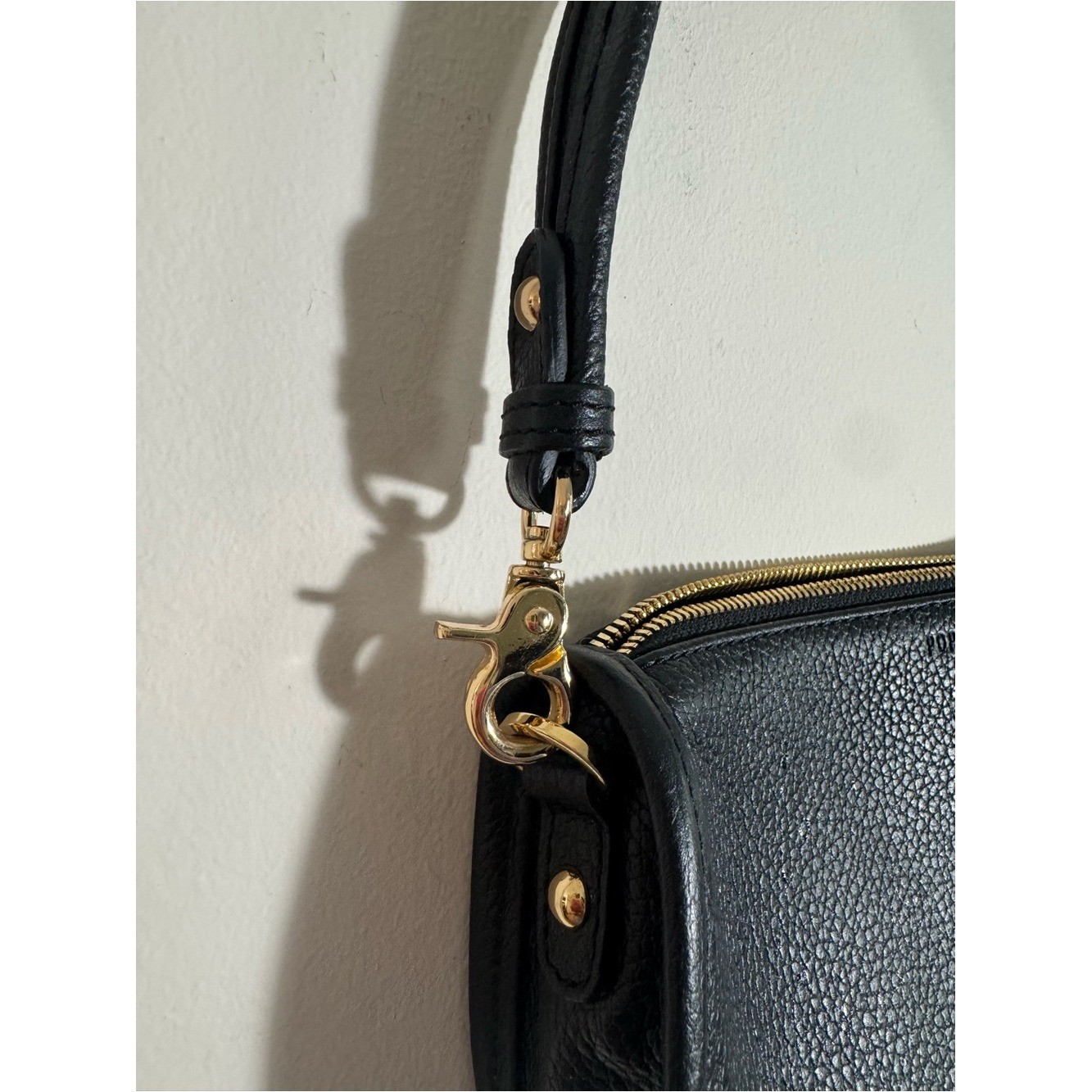 Poppy Barley The classic baguette black leather bag
