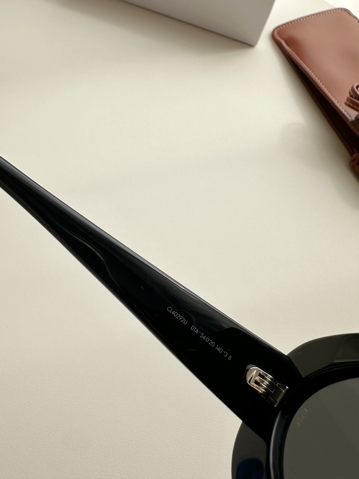 CELINE Iconic Triomphe Oval Sunglasses Black Frame Gold Logo Detail