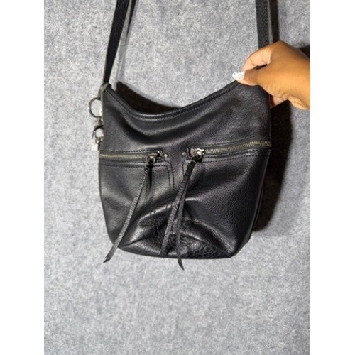 The Sak Black Pebbled Leather Crossbody Hobo Bag Silver Logo Charms Zip Pocket