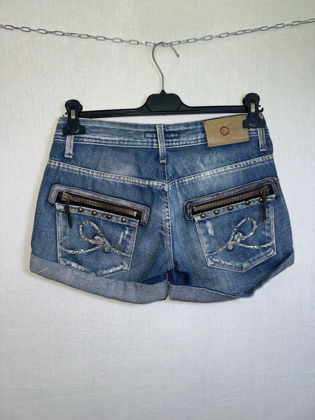 Rossodisera Low Rise Distressed Denim Studded Shorts with Zipper Pockets