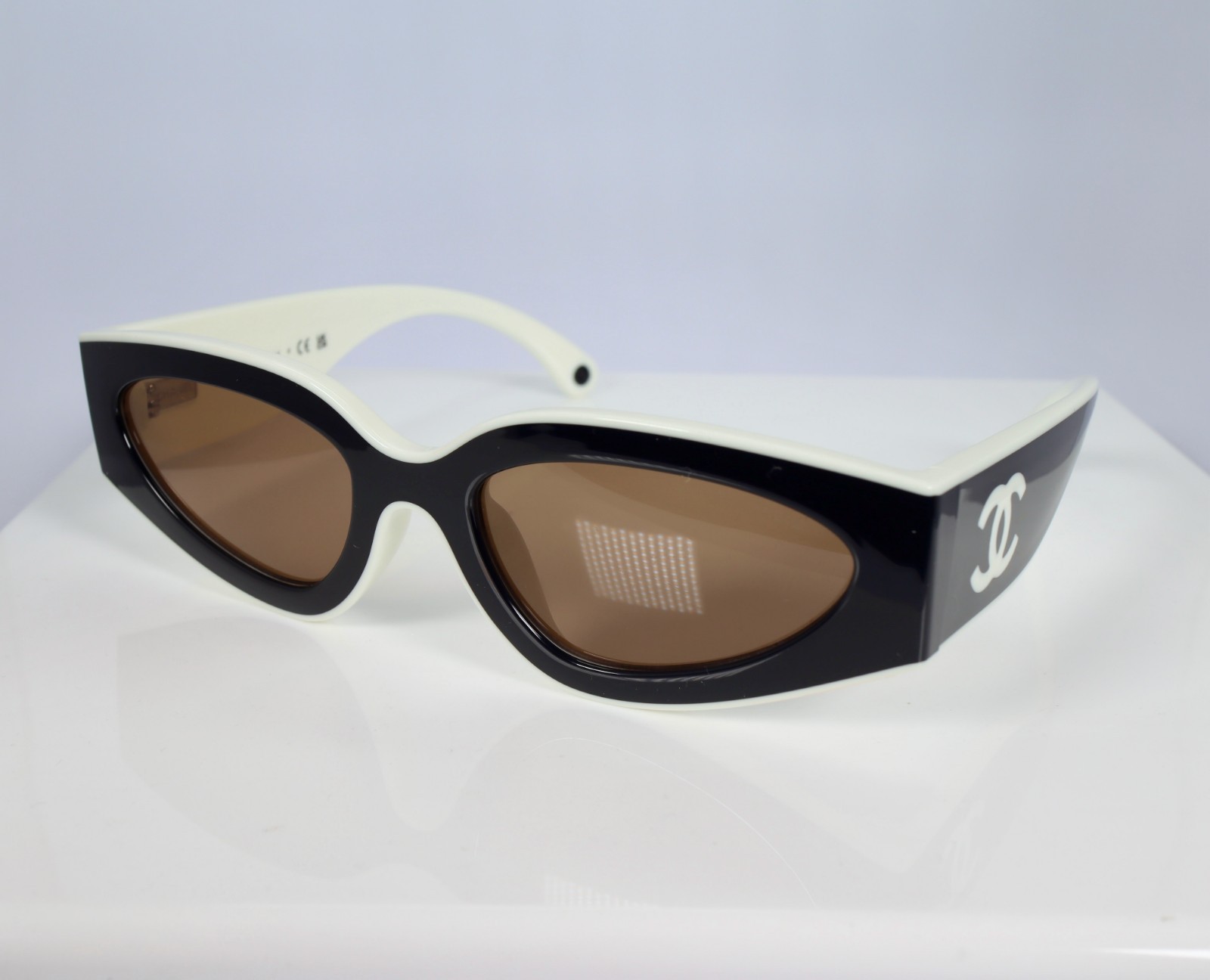 Chanel CH6056 54mm Cat Eye Sunglasses in Black and White with Beige Lenses