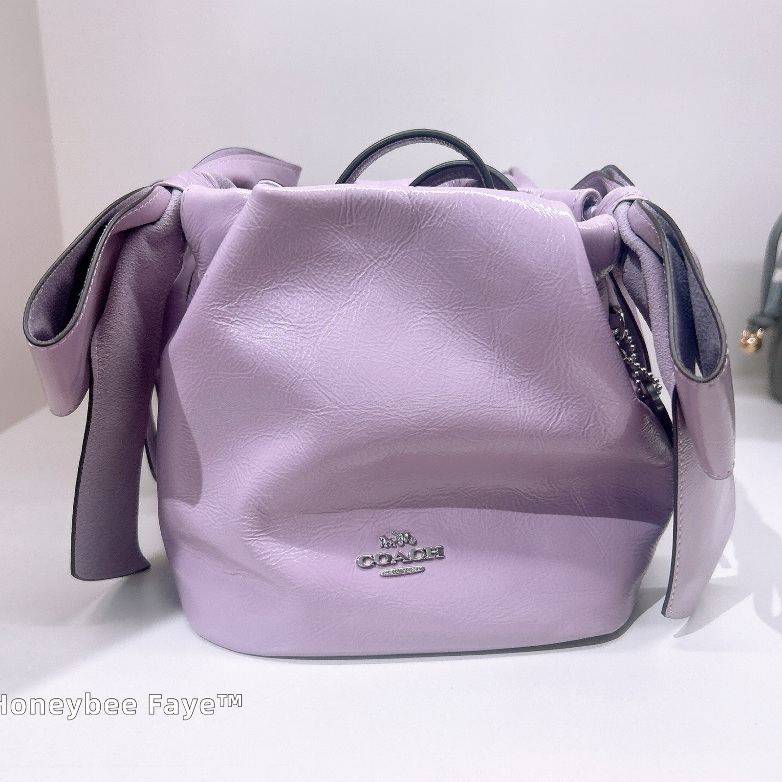 NWT Coach Faye Mini Drawstring Bag With Bows CEL03 Light Amethyst
