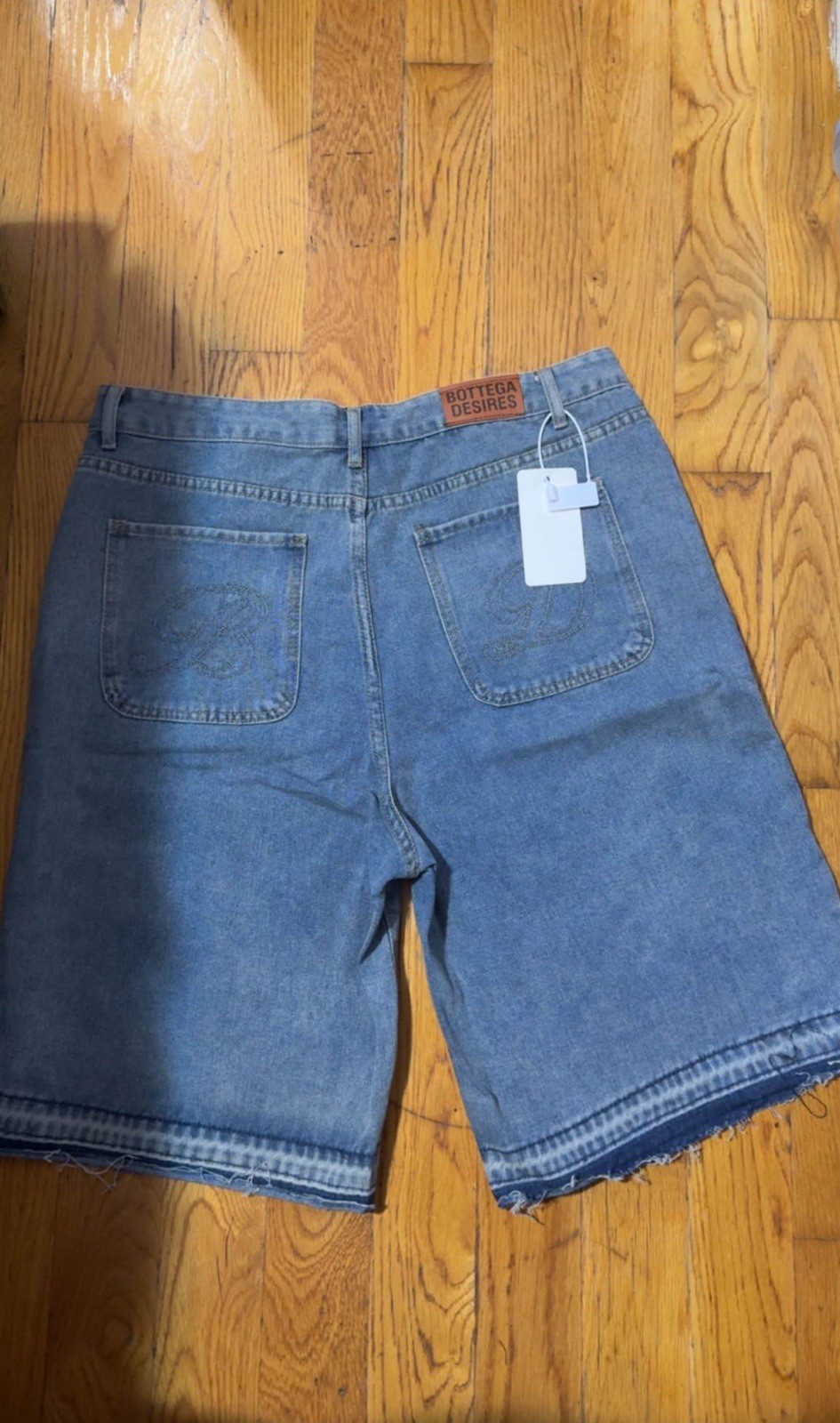 Bottega Desires Men’s Blue Denim Shorts, Raw Hem Logo, 5-Pocket, 12″ Inseam