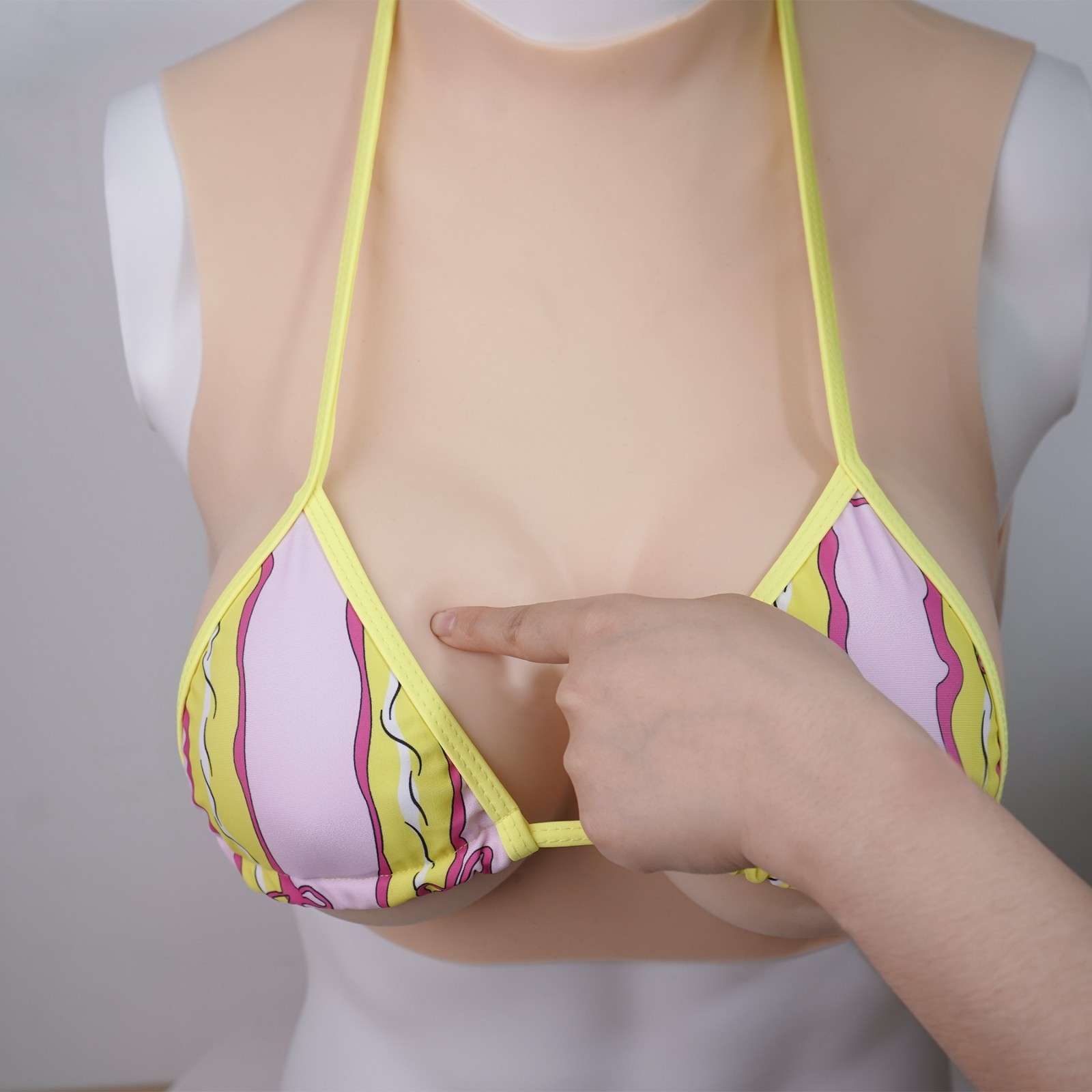 Silicone breasts designed specifically for cross-dressers to enhance bust size.