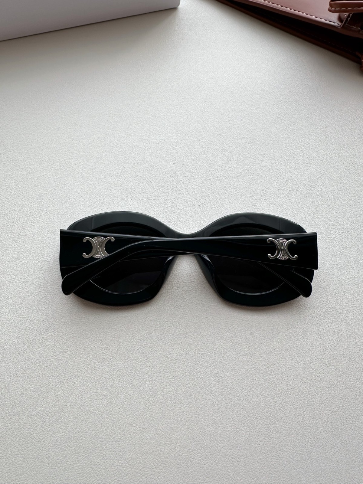 CELINE Iconic Triomphe Oval Sunglasses Black Frame Gold Logo Detail
