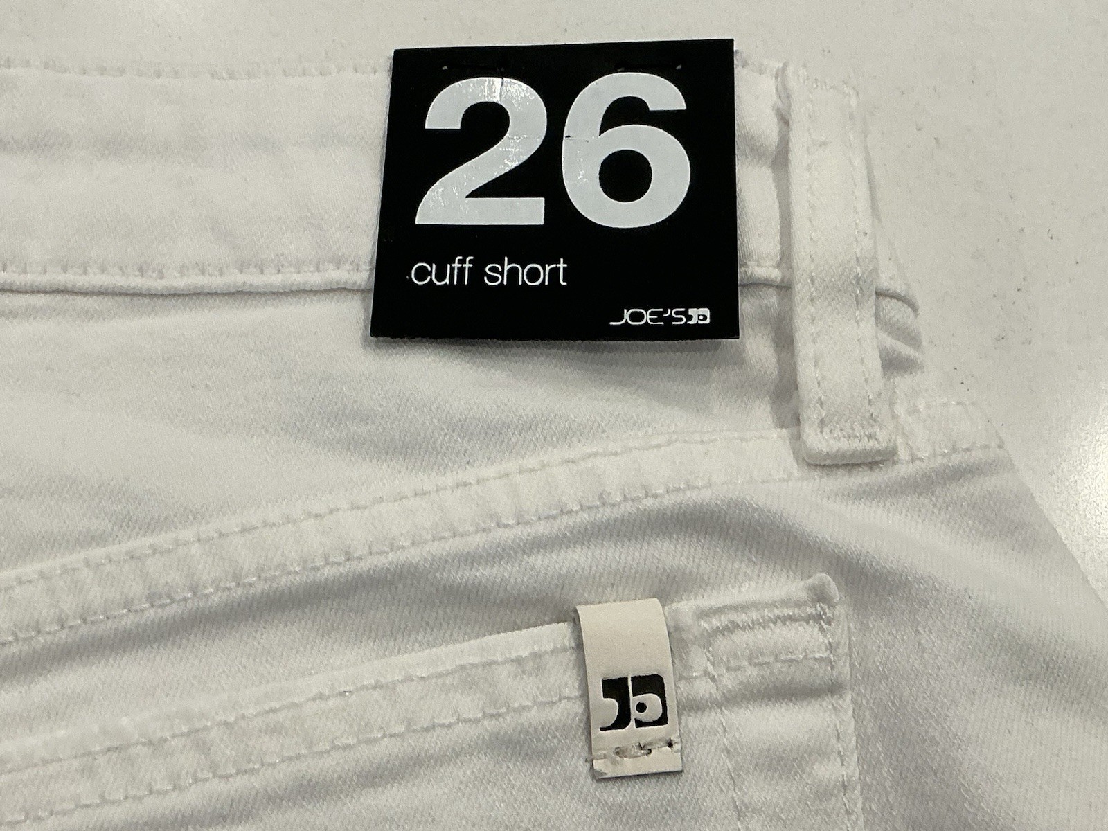 JOE’S Azami White Jean Shorts. Waist 28.5”/Inseam 2.5”/Rise 8.75”. Size 26. NEW.