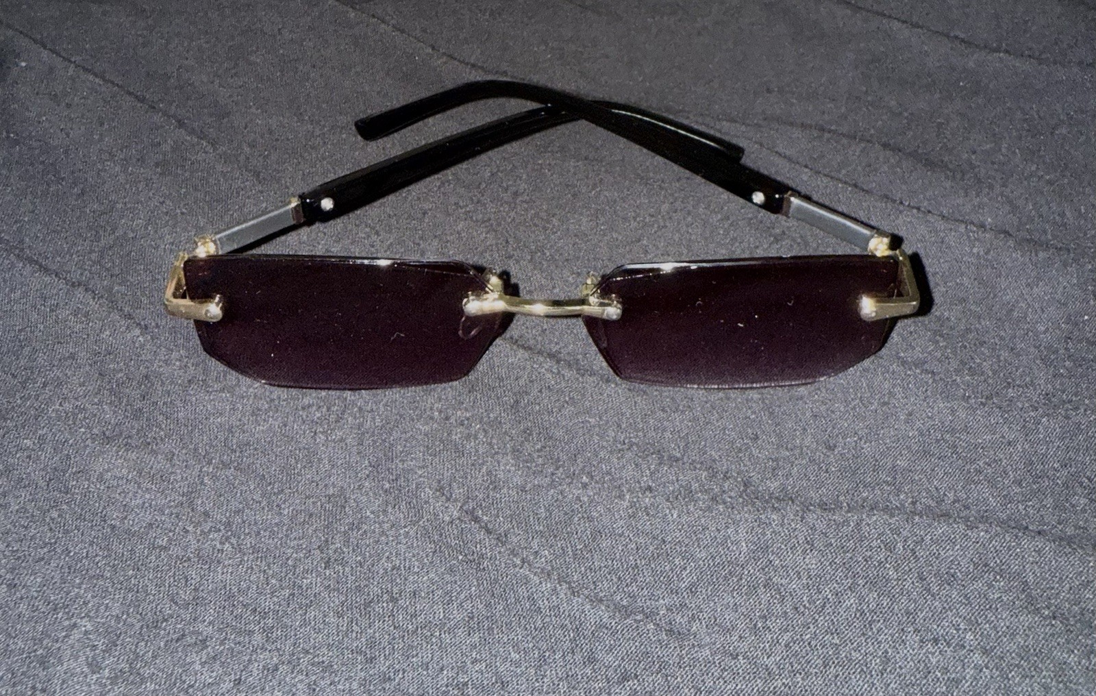 Rimless Rectangle Purple Tinted Lens Sunglasses Gold Frame Black Arms