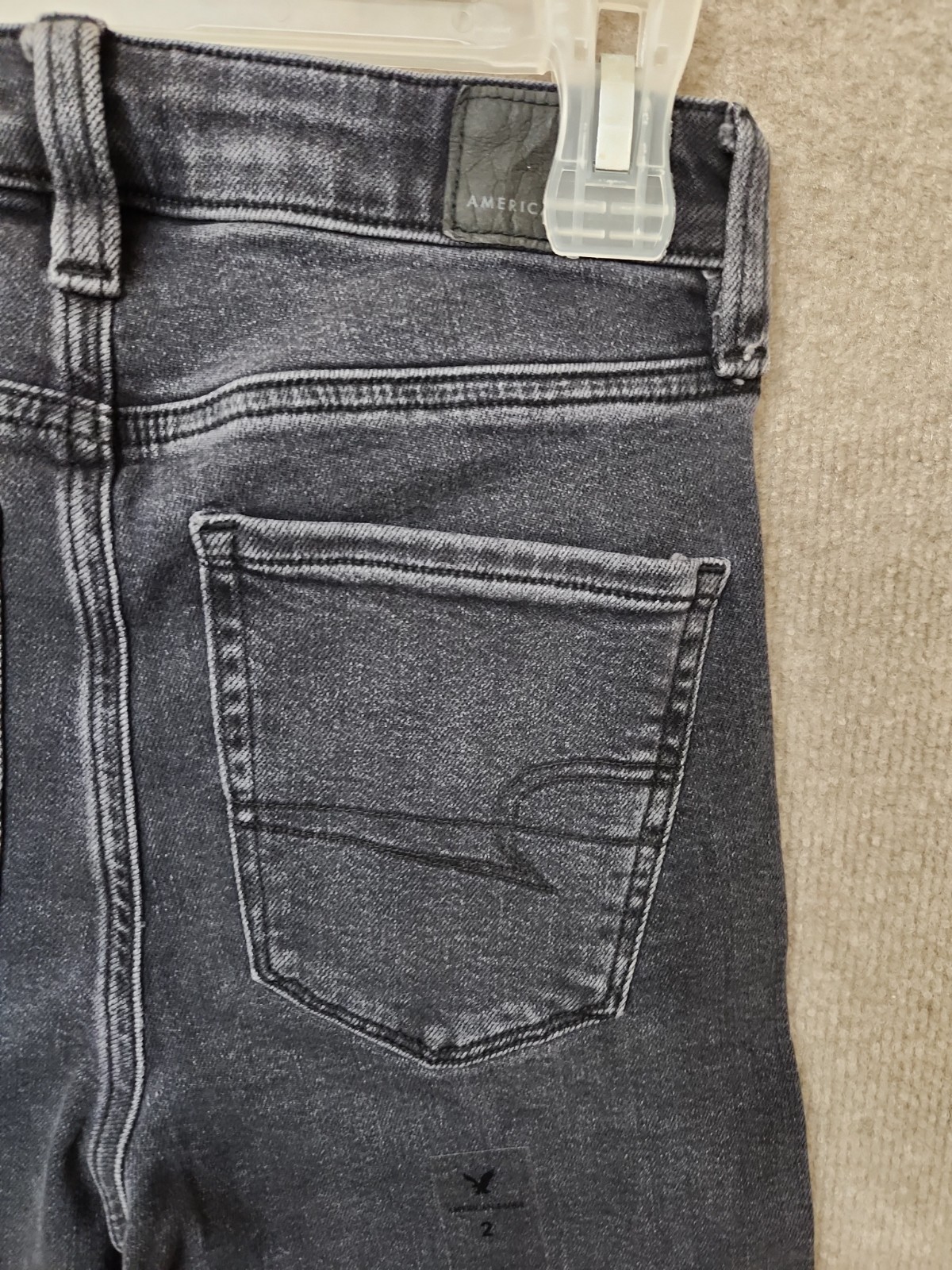 American Eagle Super Stretch Jegging Jeans Womens 2 Black Wash Raw Hem NEW
