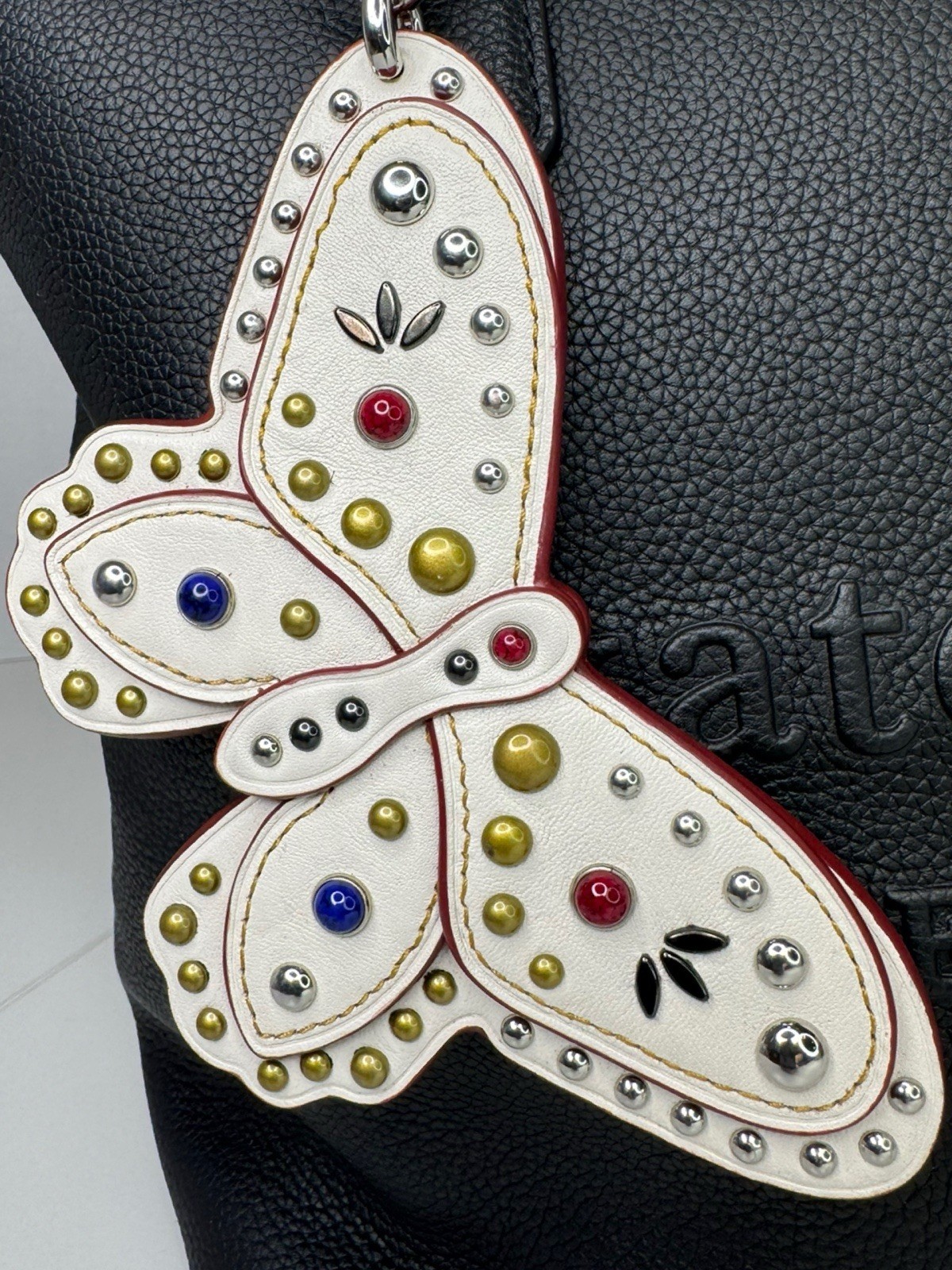 Coach Butterfly Large Leather Chalk White Colored Stone Metal Rivets Keychain