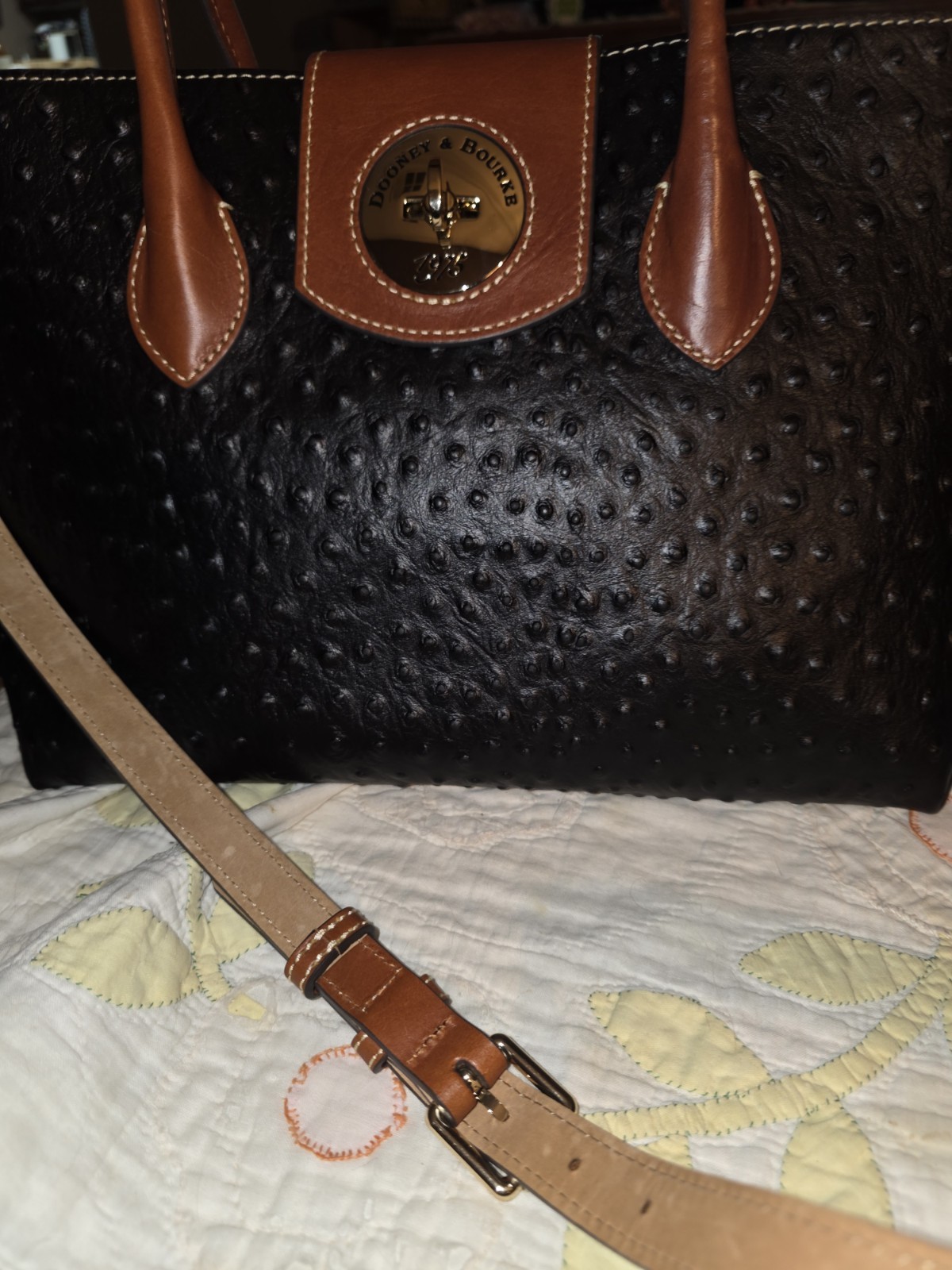Dooney and Bourke Ostrich Turnlock Flap Handle Tote Black with Brown Trim