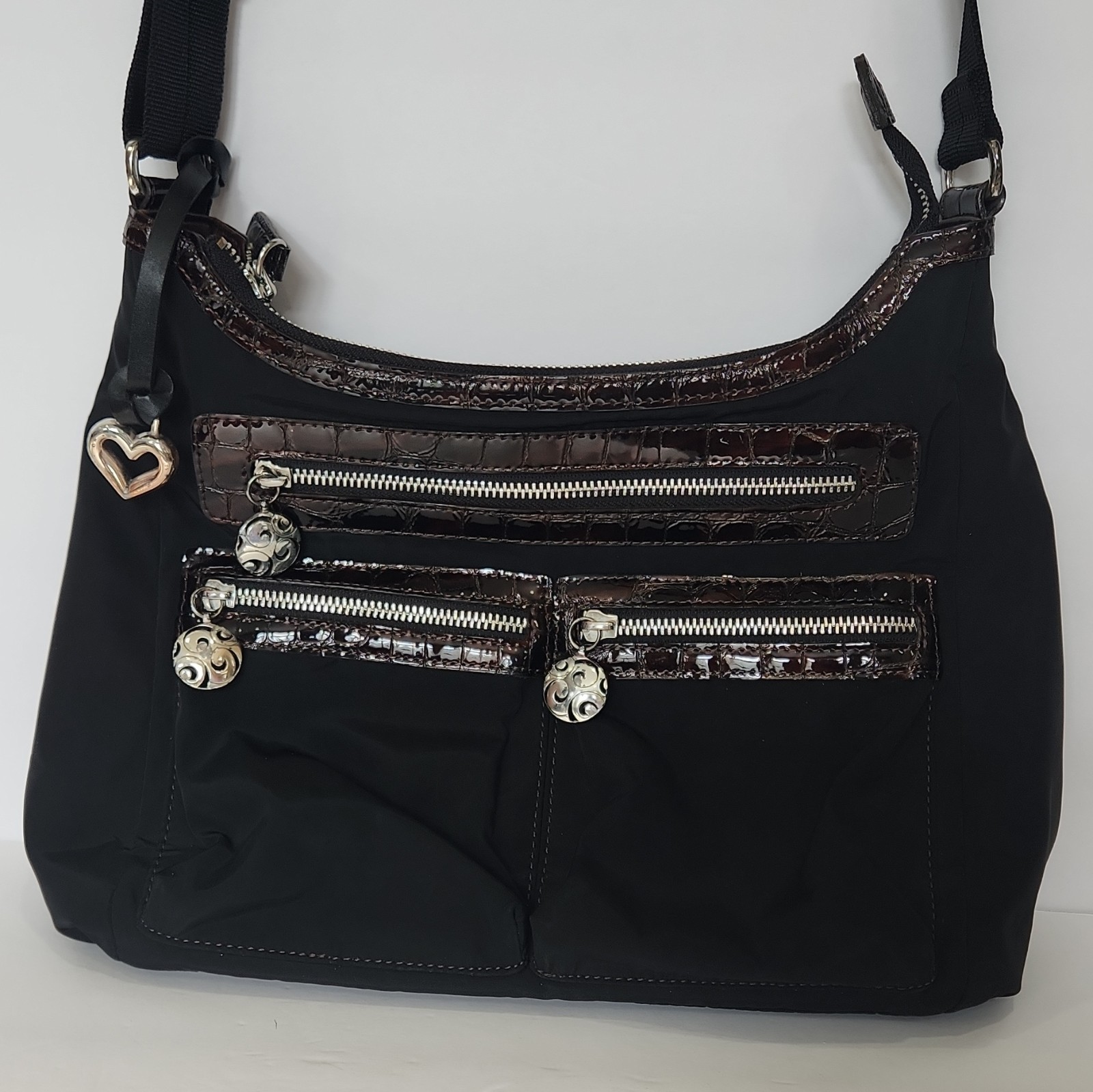 Brighton Black Crossbody Bag, Adjustable Strap, Zip, Pockets, Charm