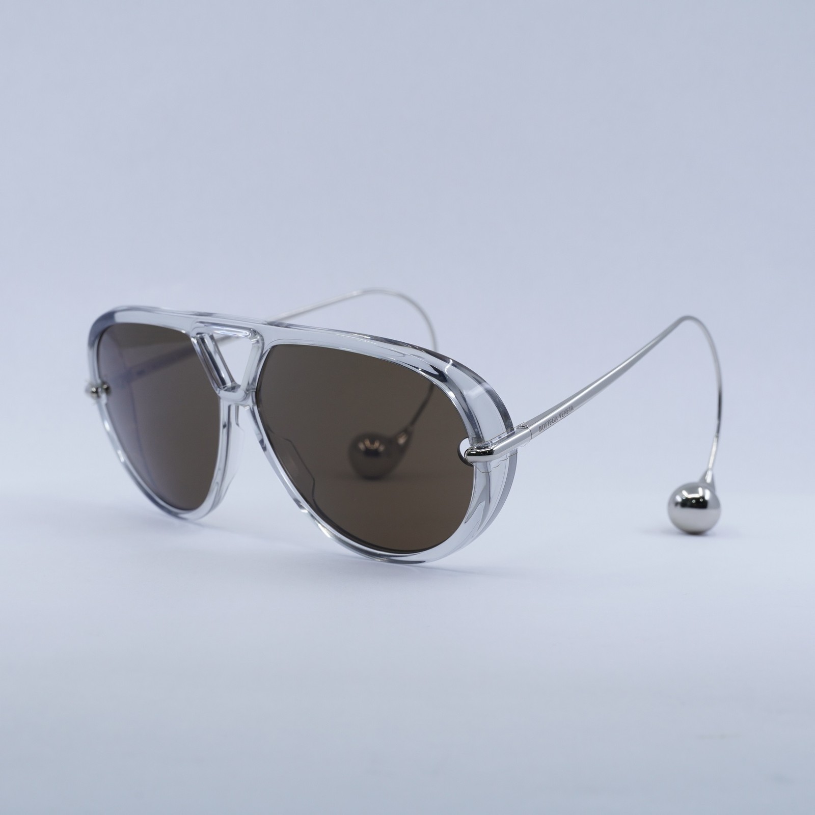 BOTTEGA VENETA BV1273S 009 Transparent Grey/Silver/Brown 63-12-180 Sunglasses…