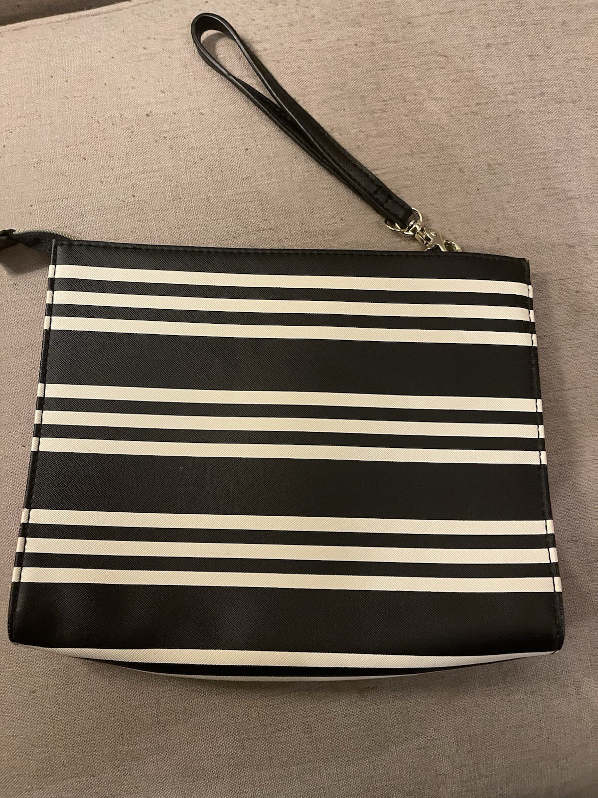 Betsey Johnson wristlet black and white checkerboard print and a pink logo