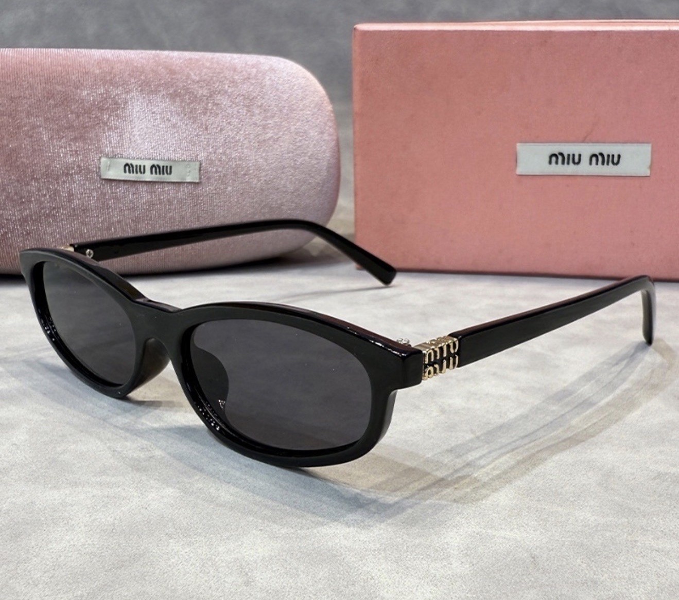 MIU MIU MU11ZSF 16K5S0 Black/Dark Grey 52-15-140 Sunglasses