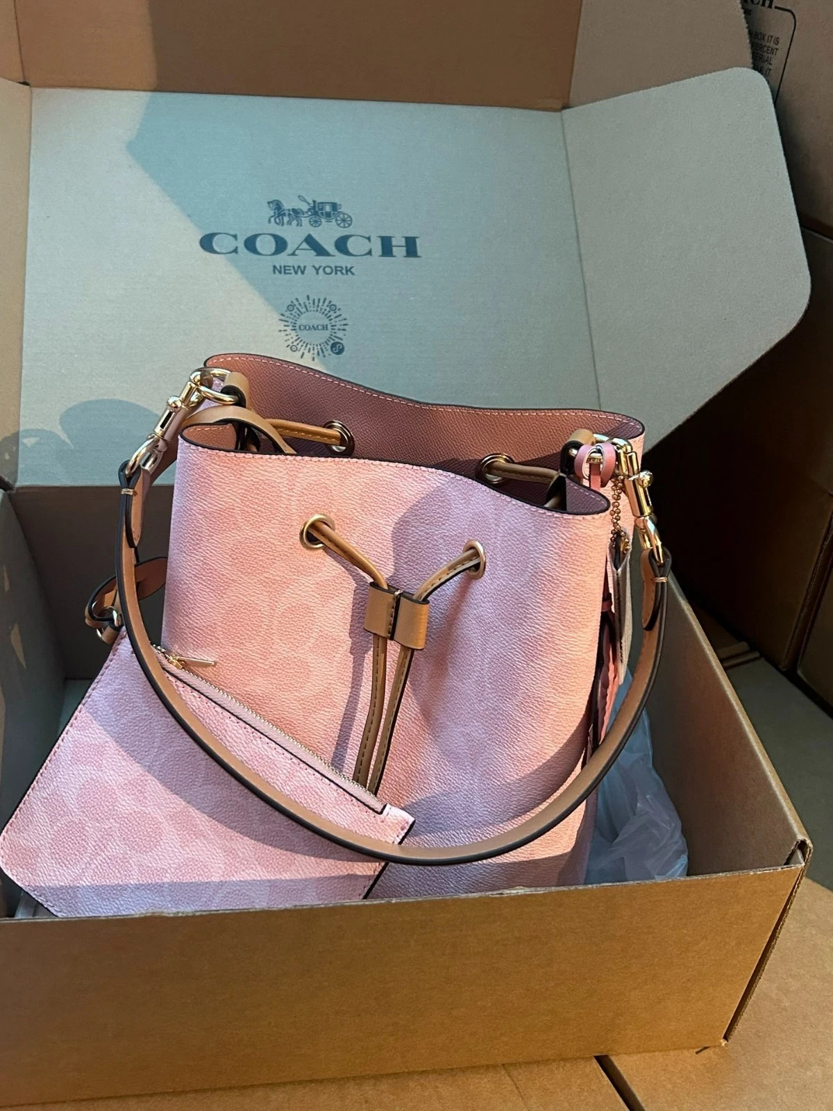 Coach CEA23 Rowan Bucket Bag In Signature Canvas With Charms Powder Pink