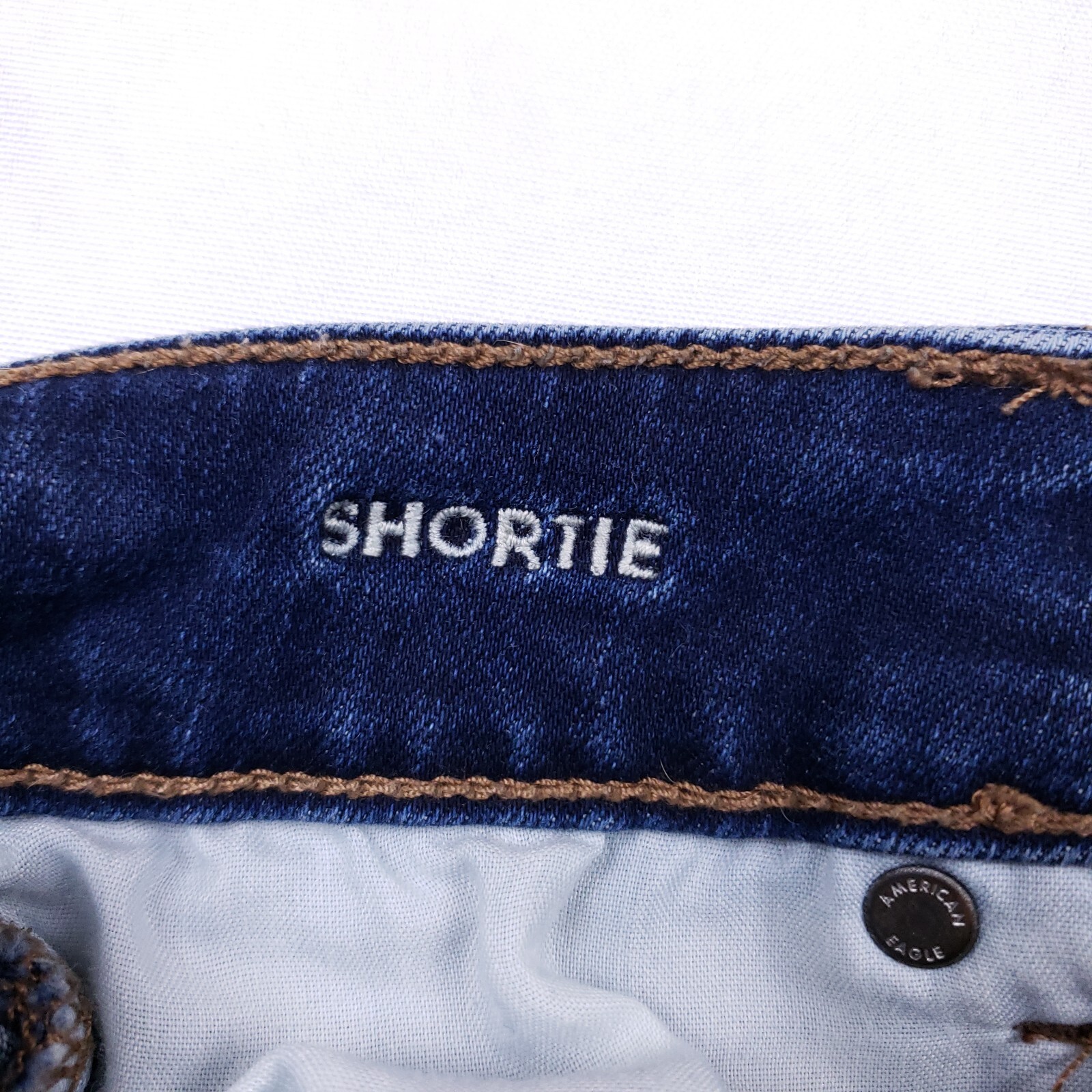 American Eagle Shortie Denim Shorts 26 in Blue Frayed Hem Coastal Cowgirl Chic