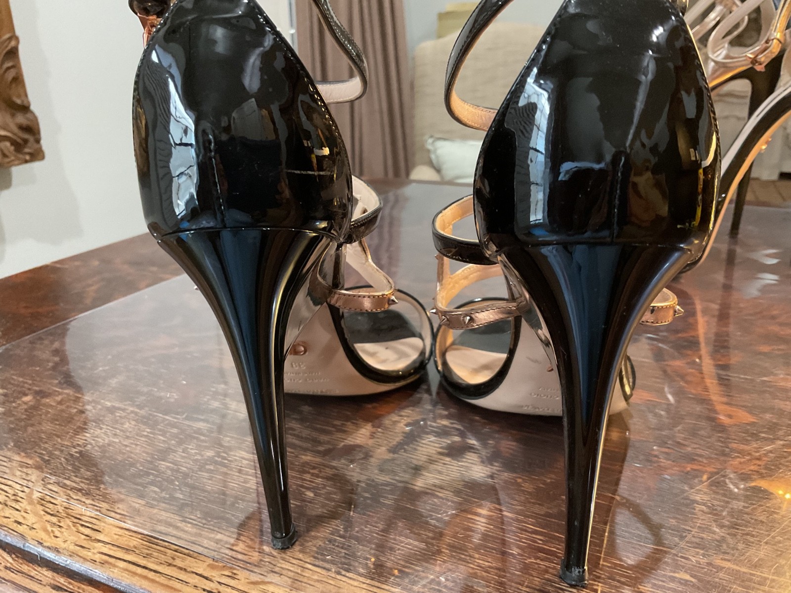 Ruthie Davis Size 9 Strappy Black Stilletos w Gold spike embellishments.
