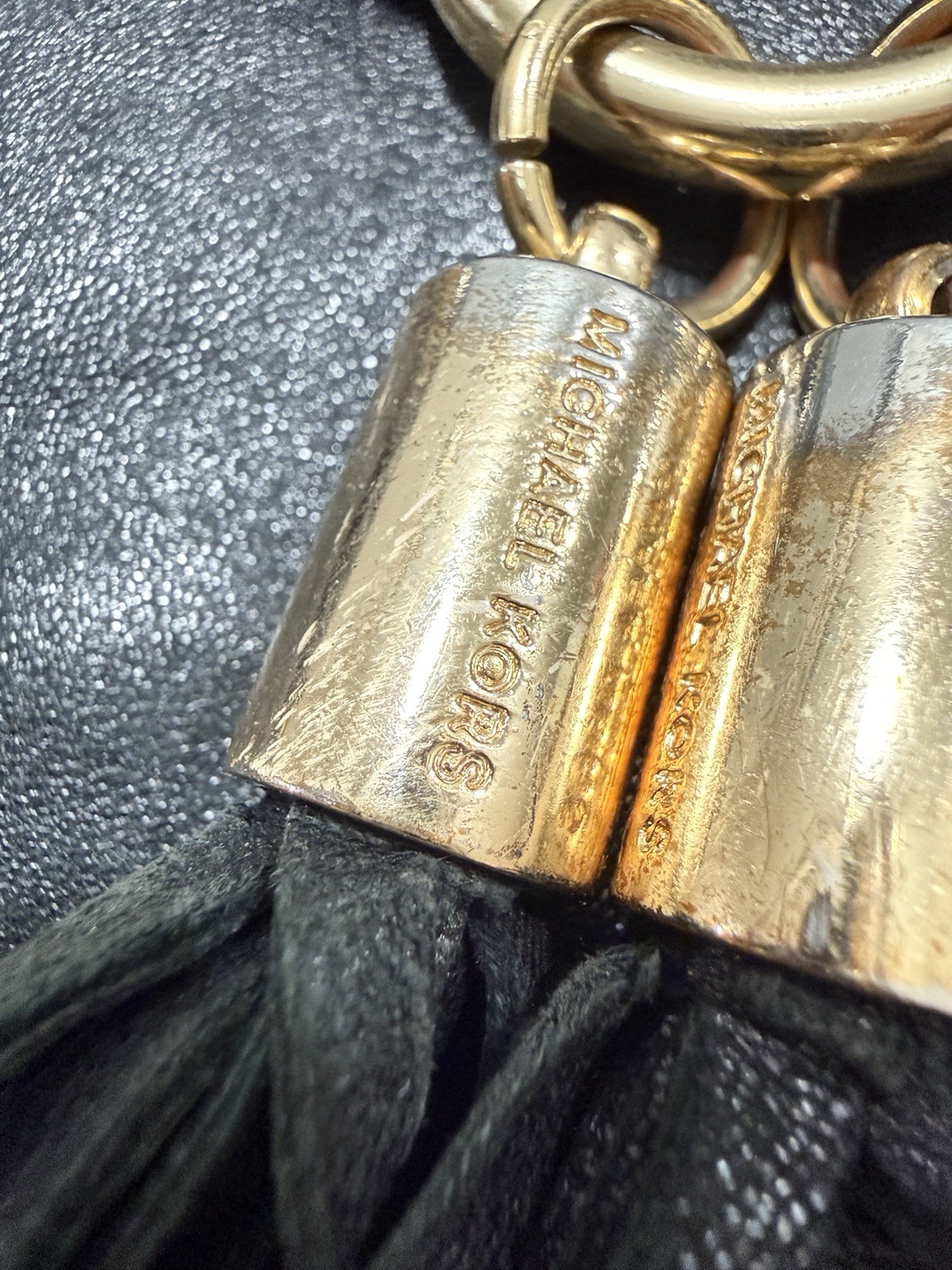 Michael Kors Black Shoulder Bag Braided Strap Gold Grommets Tassel Charm