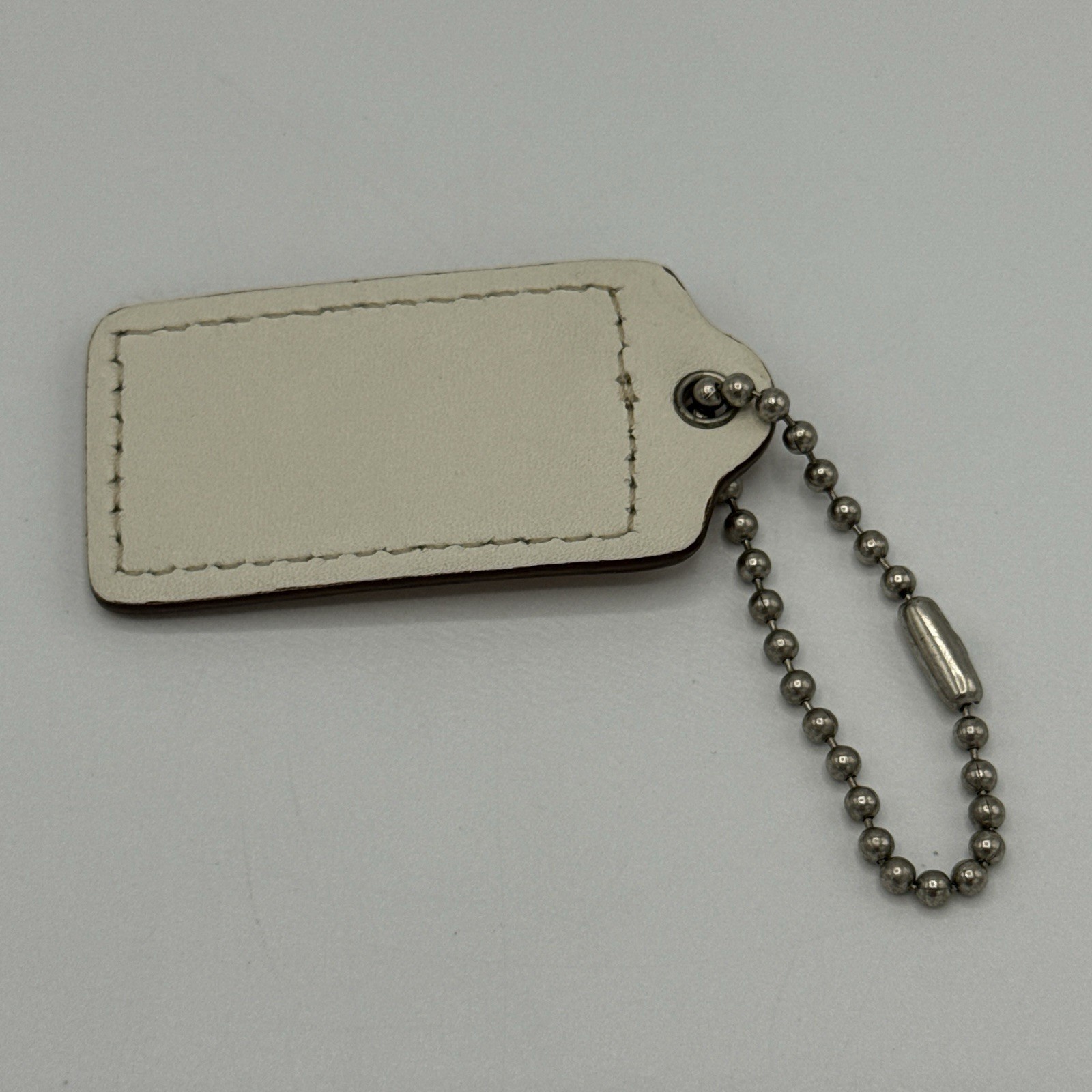 Coach Hang Tag Light Brown Leather Colored 2 & 1/2 Inches Wide / Silver Tone