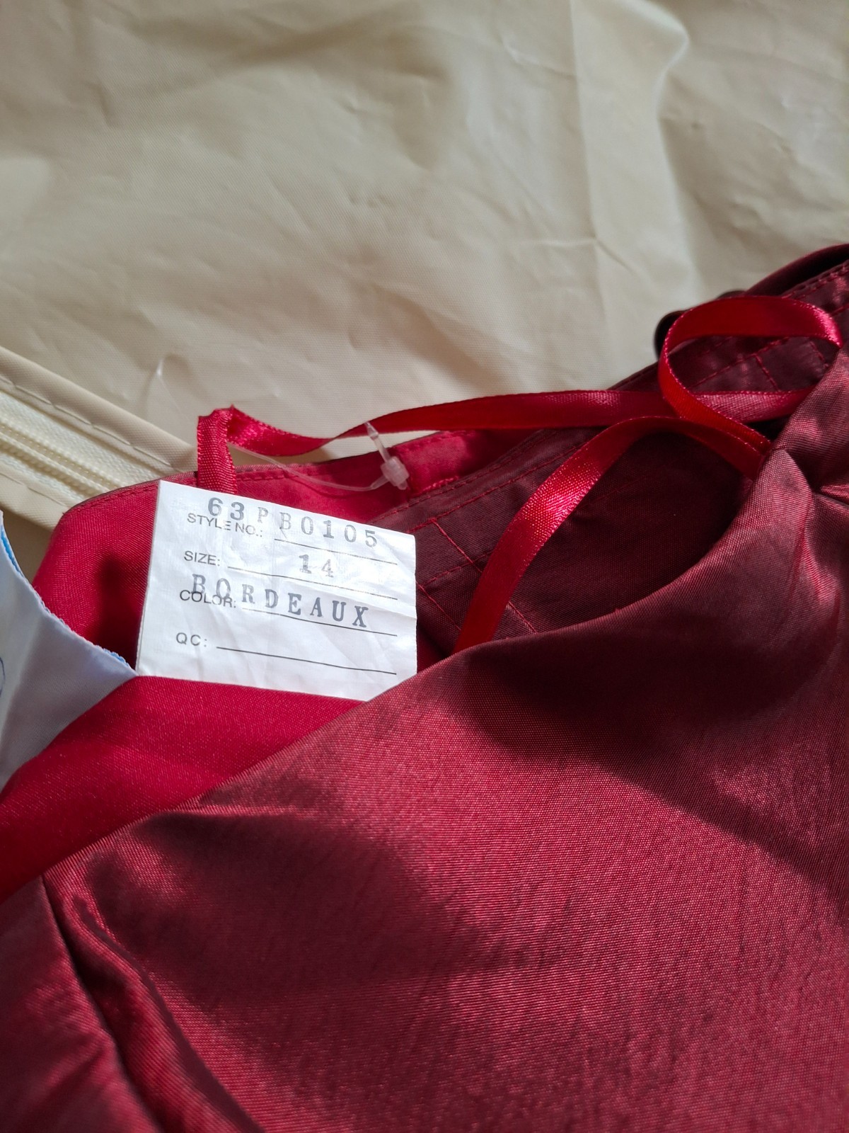 Red prom dress size 14 with lace up back ribbon and front bow
