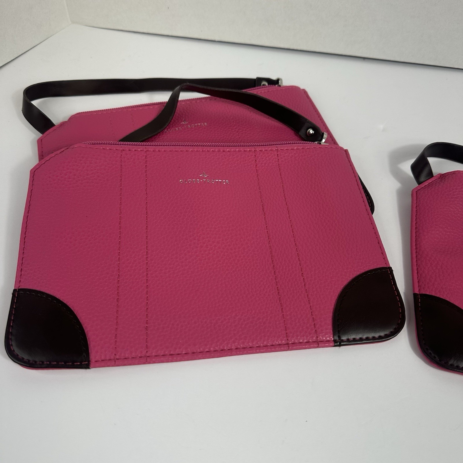 Globe-Trotter x ANA Pink Zip Wristlet Clutch, Black Strap, Geometric Lined