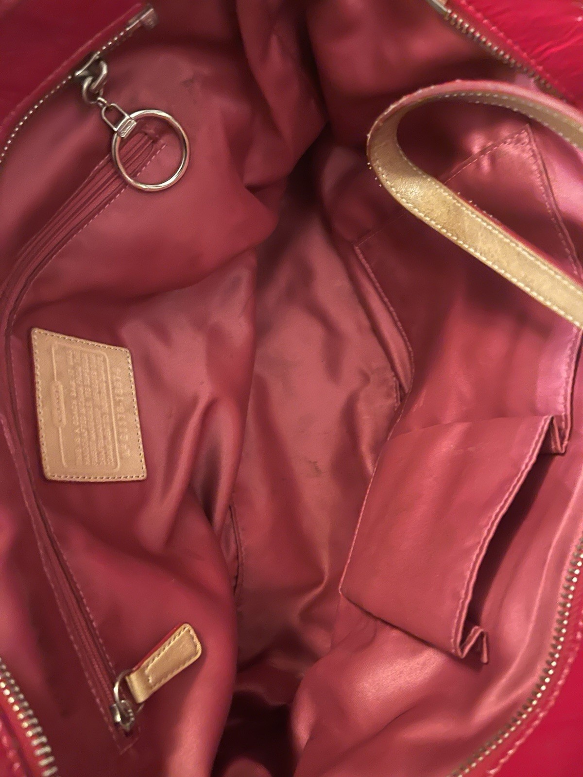 Coach Poppy Daisy Liquid Gloss tote bag, featuring quilted red patent leather