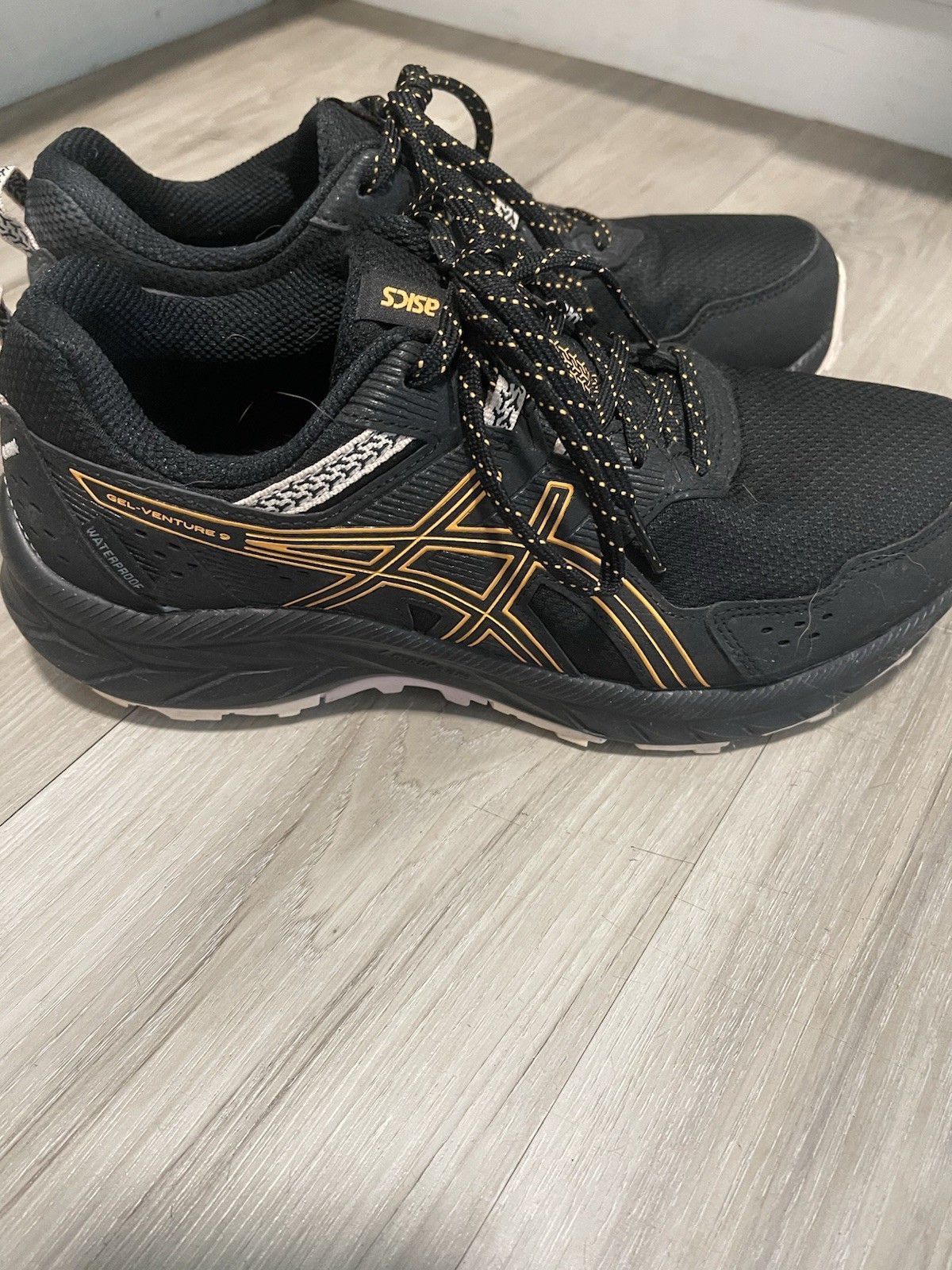 ASICS Gel Venture 9 Waterproof Ortholite Black Orange Women’s size 8