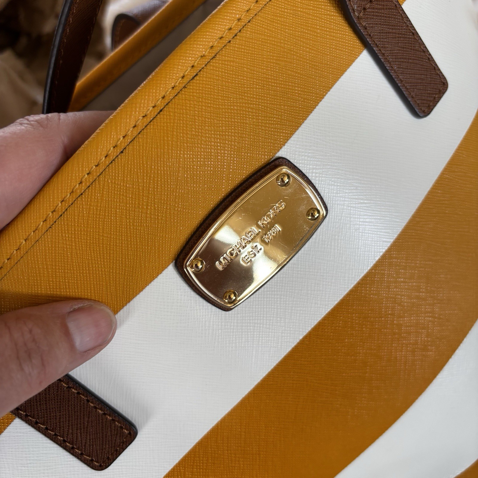 Michael Kors purse, Yellow And White Stripped, With Brown Straps.
