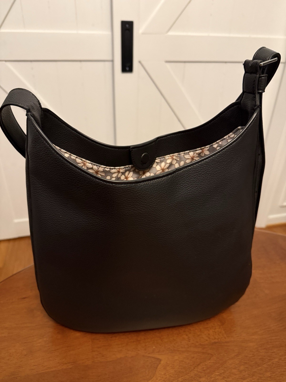 Black Pebbled Floral Lined Medium Crescent Shoulder Bag Adjustable Strap Snap