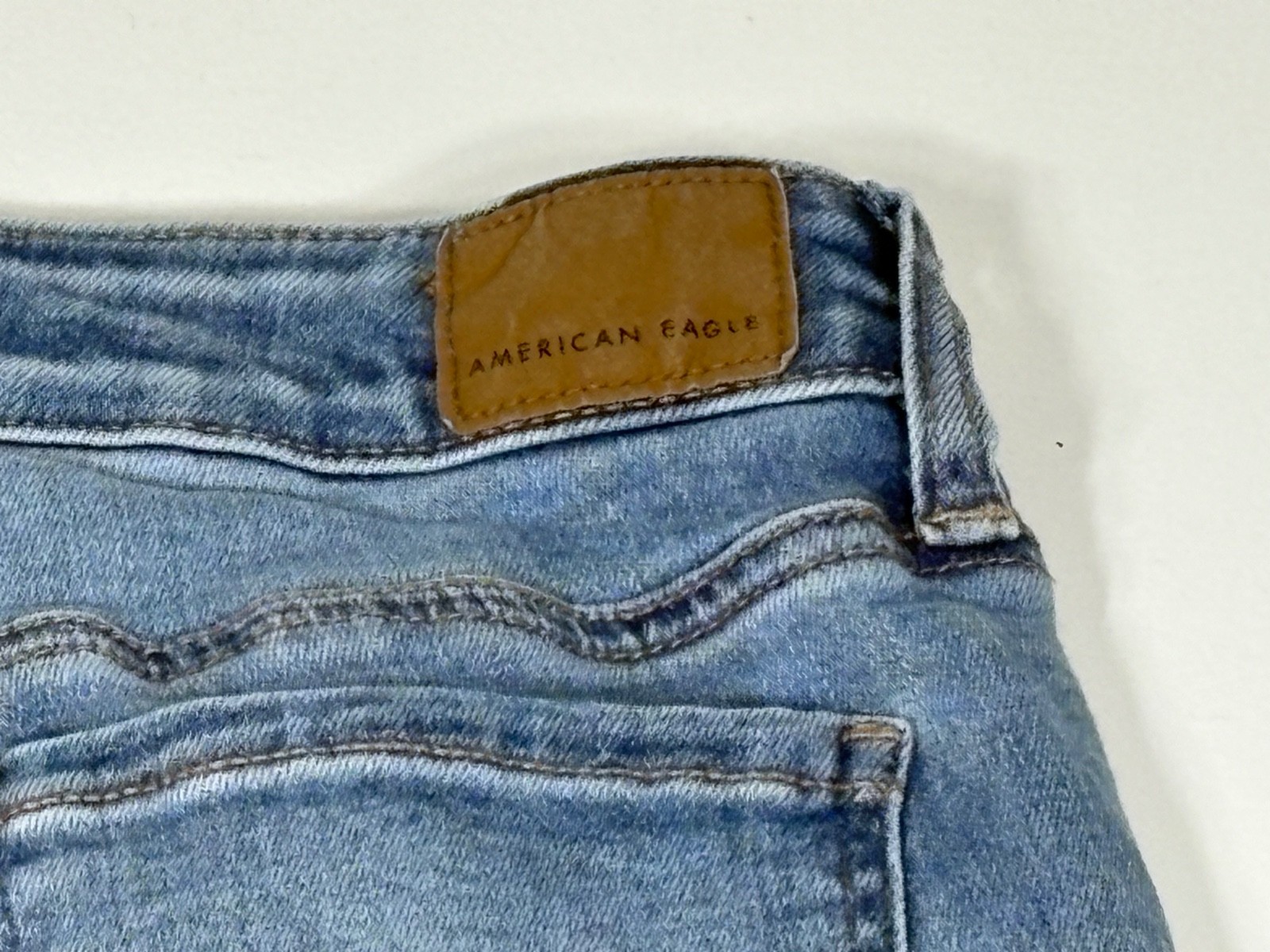 American Eagle jegging women 2 distressed skinny light wash frayed hem Tight