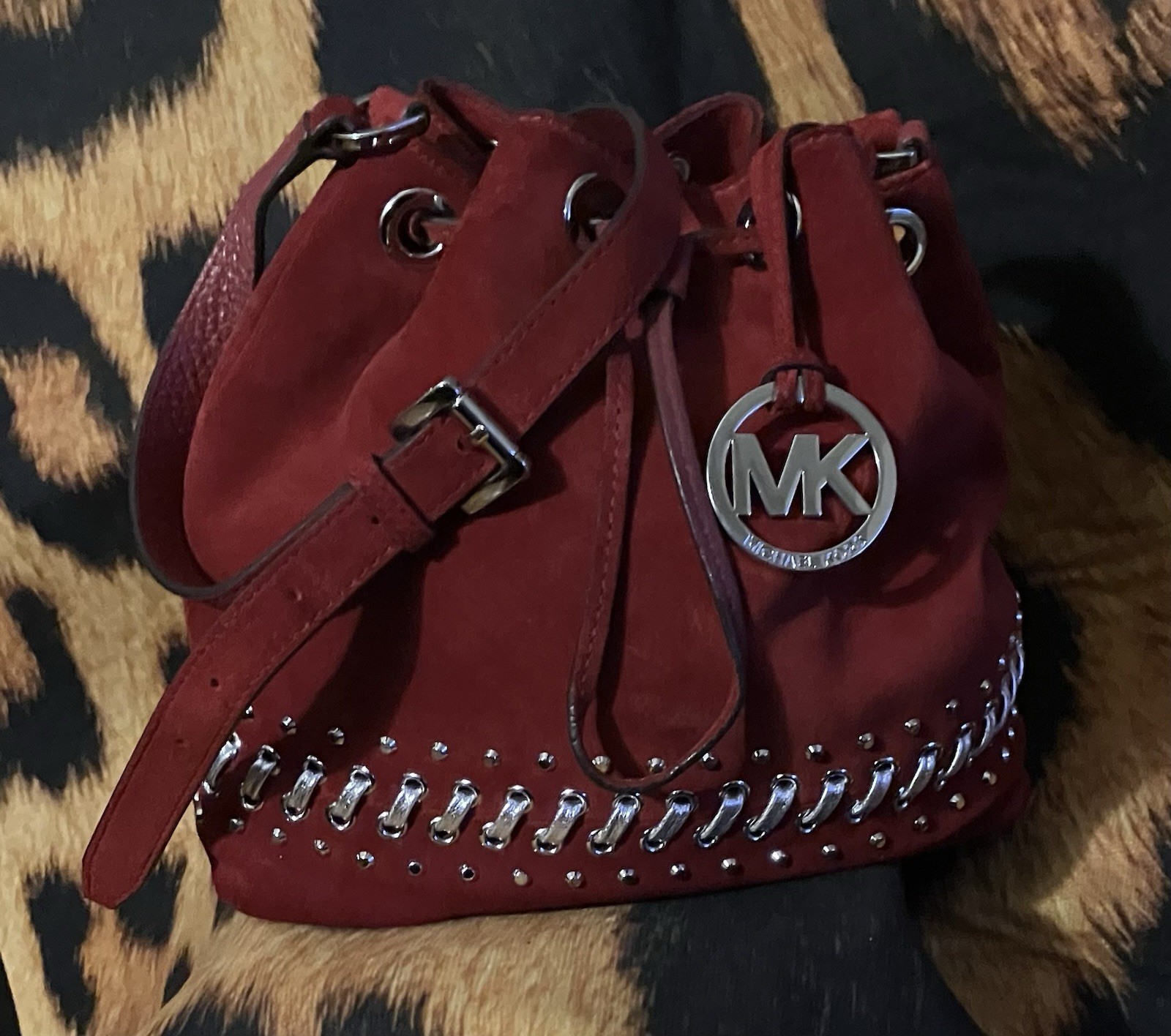 MICHAEL KORS RED HIPPIE JULES SUEDE CROSSBODY SILVER LACES, STUDS AND DRAWSTRING