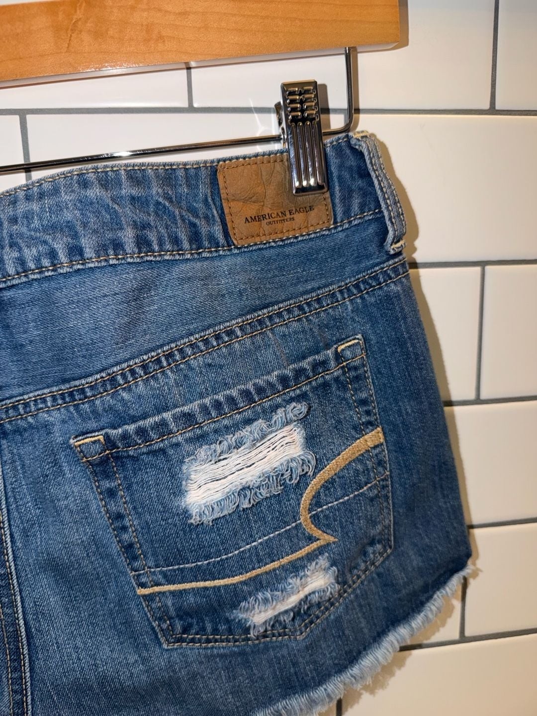 American Eagle Distressed Tomgirl Shortie Denim Shorts