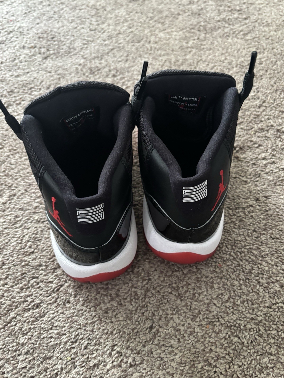 Jordan Air Jordan 11 Retro Mid Top Lace-Up Sneaker Black/Red/White 378038-061