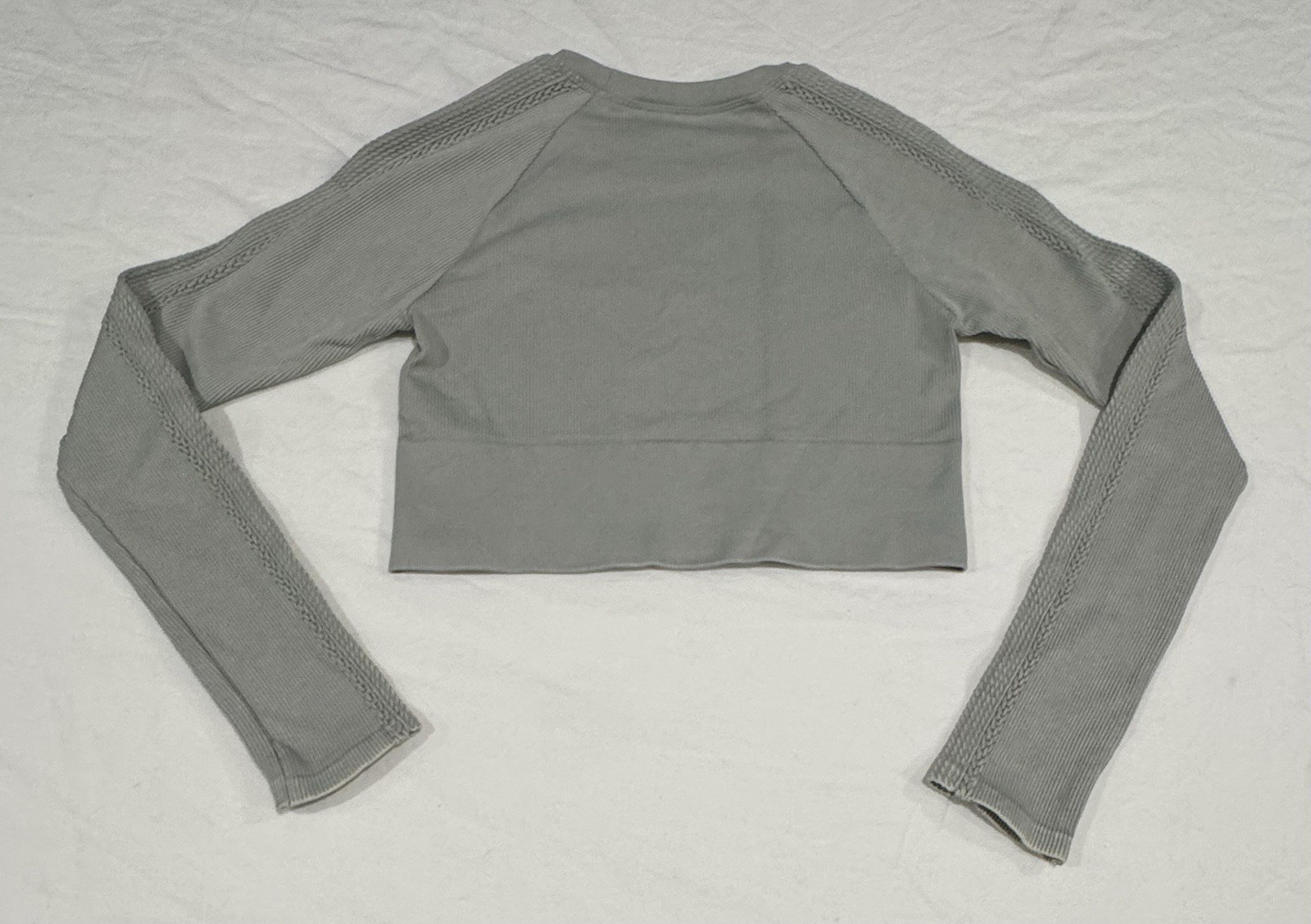 Offline by Aerie Big Chill Seamless Long Sleeve Crop Top in a grey/stone color