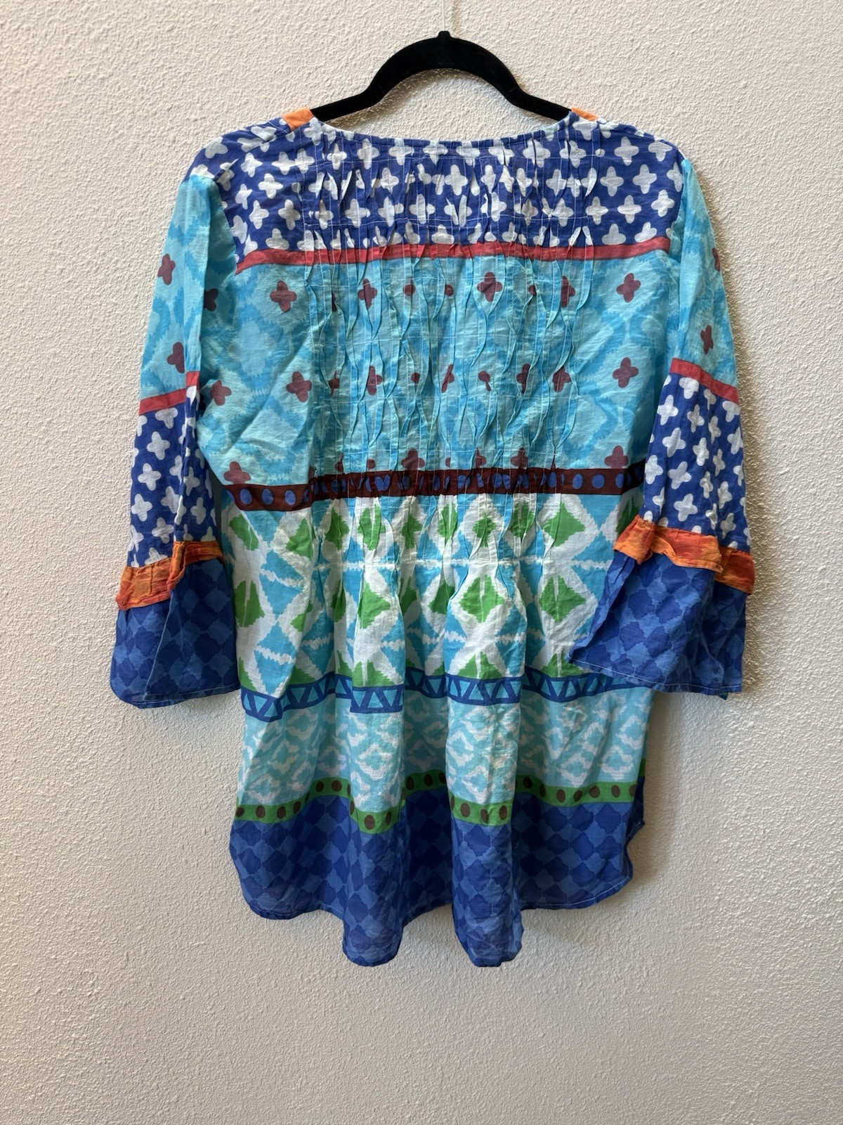 NWT LulaLife vibrant, multi-patterned top cotton v-neck Button closures. Size: L