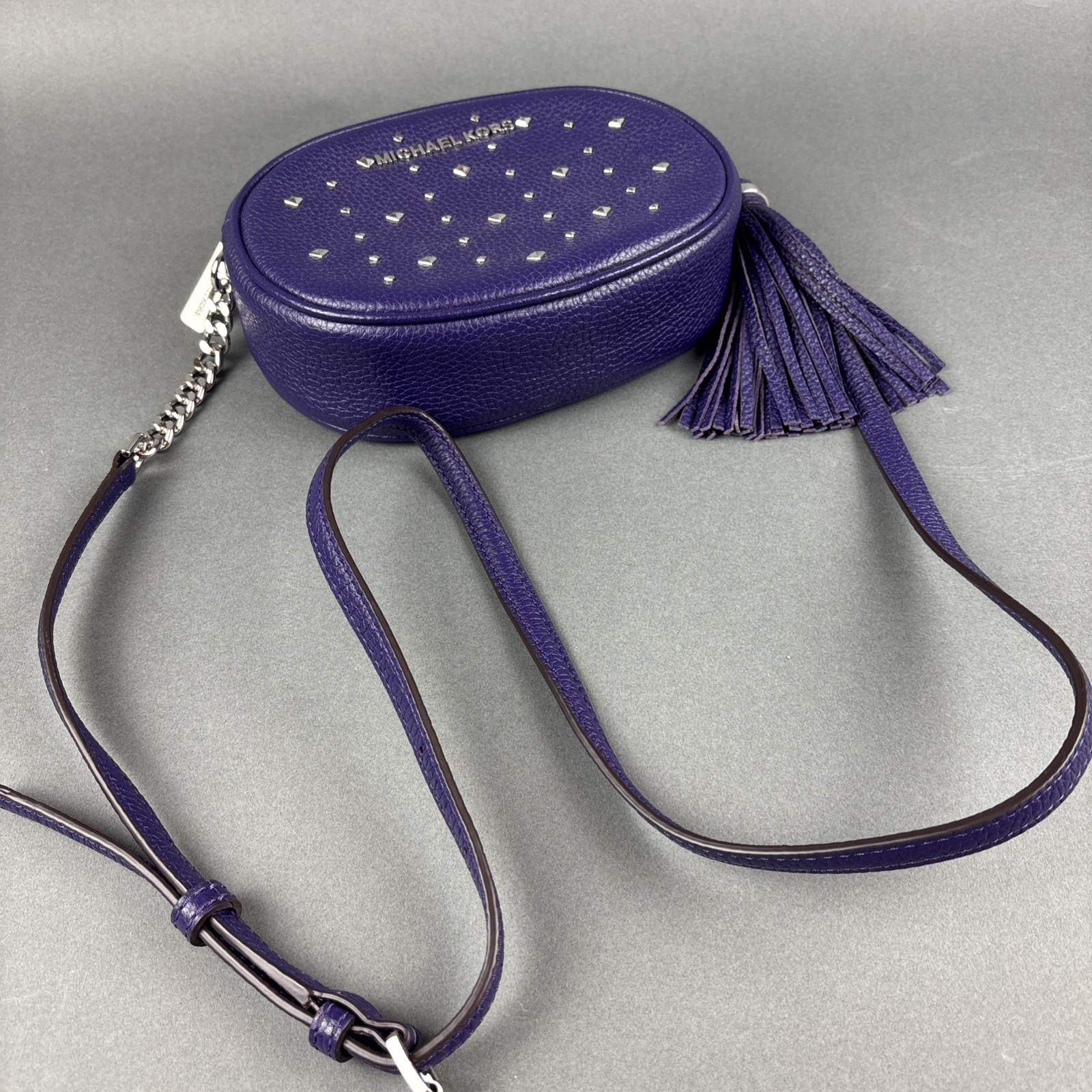 Michael Kors Purple Pebbled Leather Small Oval 7.75″x5.5″ Crossbody Bag w/Tassel