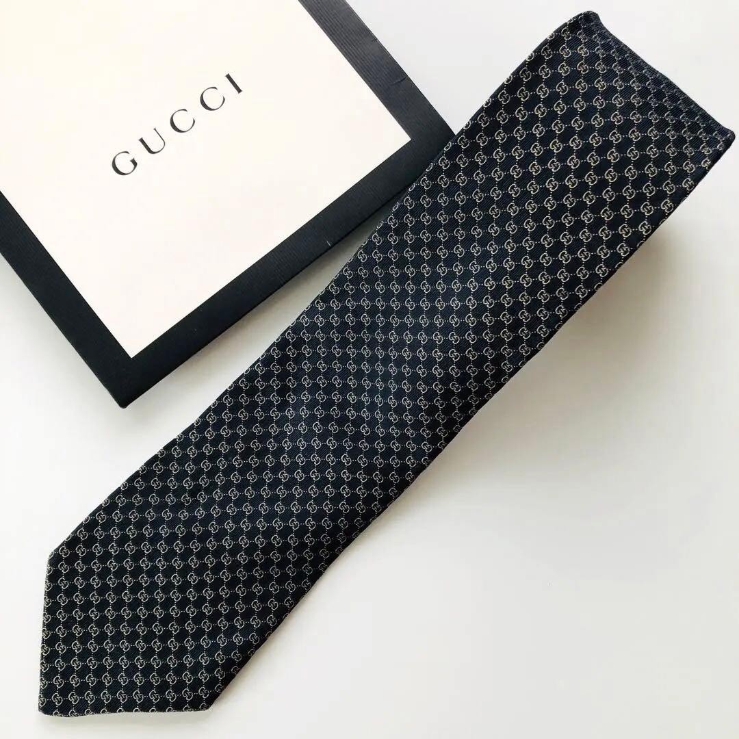 GUCCI Emblem Pattern Silk Tie Black Bronze 8.3cm Wide 154cm Long Pre-owned