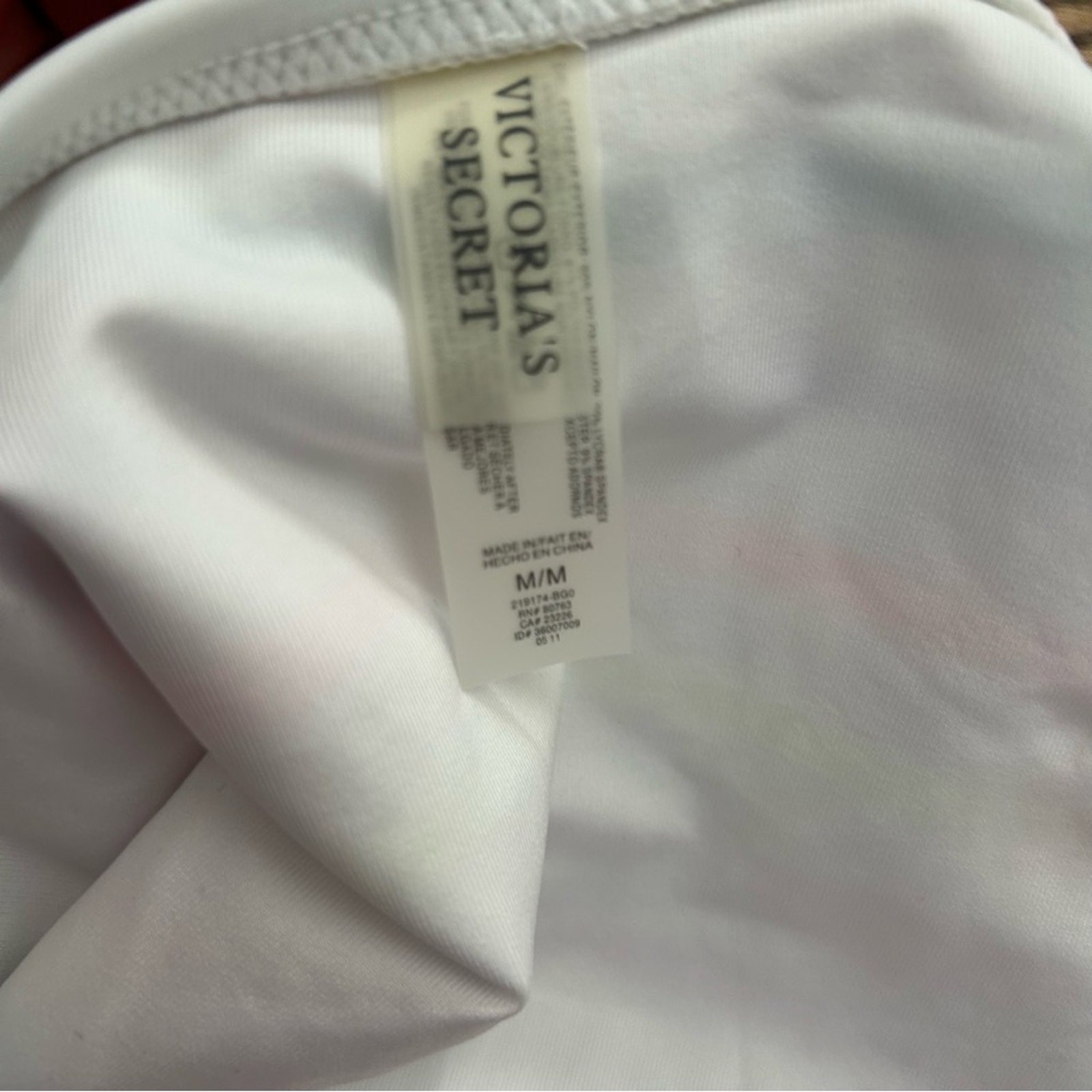 Victoria’s Secret NWOT medium white with multi colored stripes triangle bikini