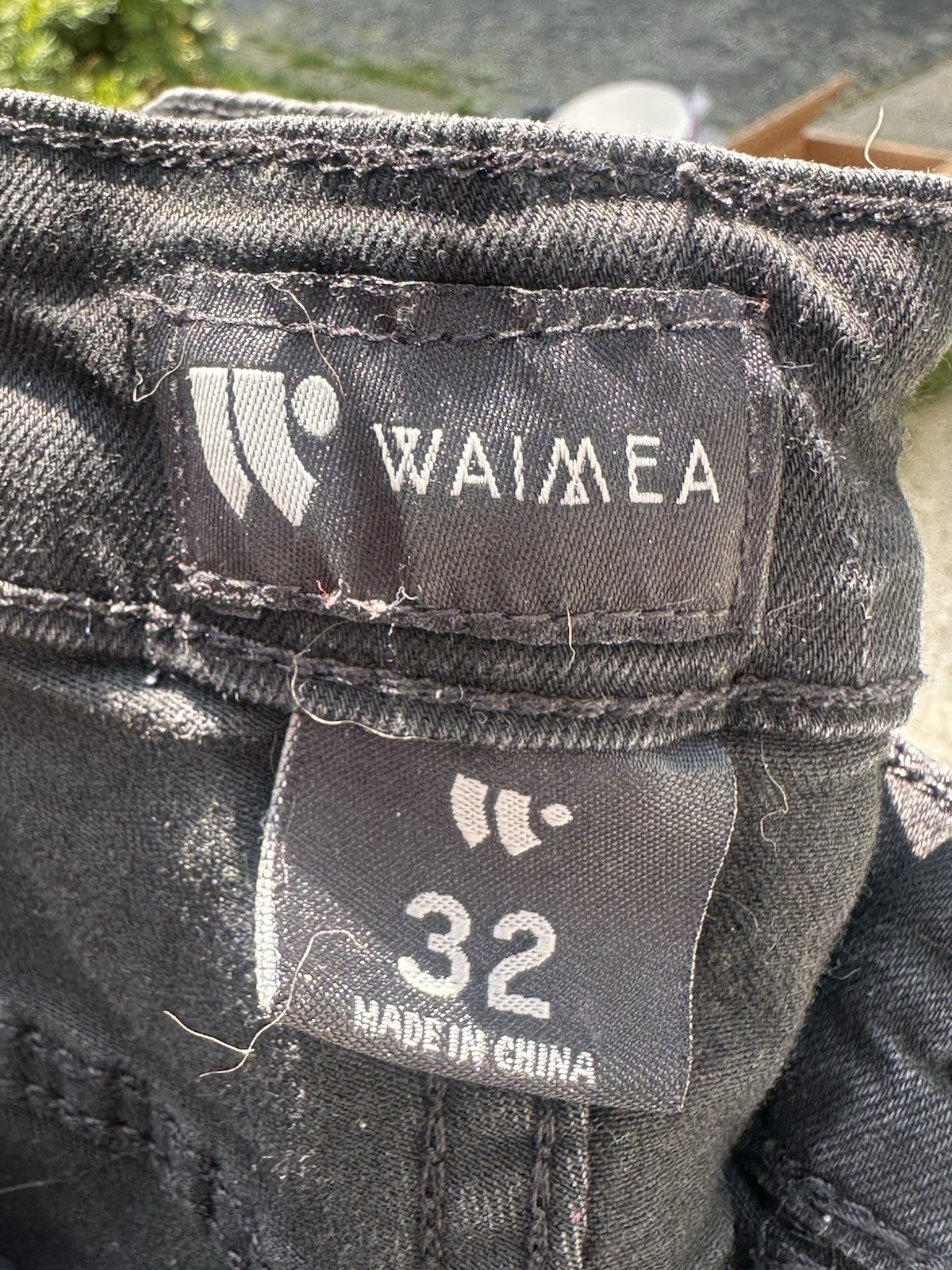 Waimea black skinny jeans with rhinestone skull. Size 32